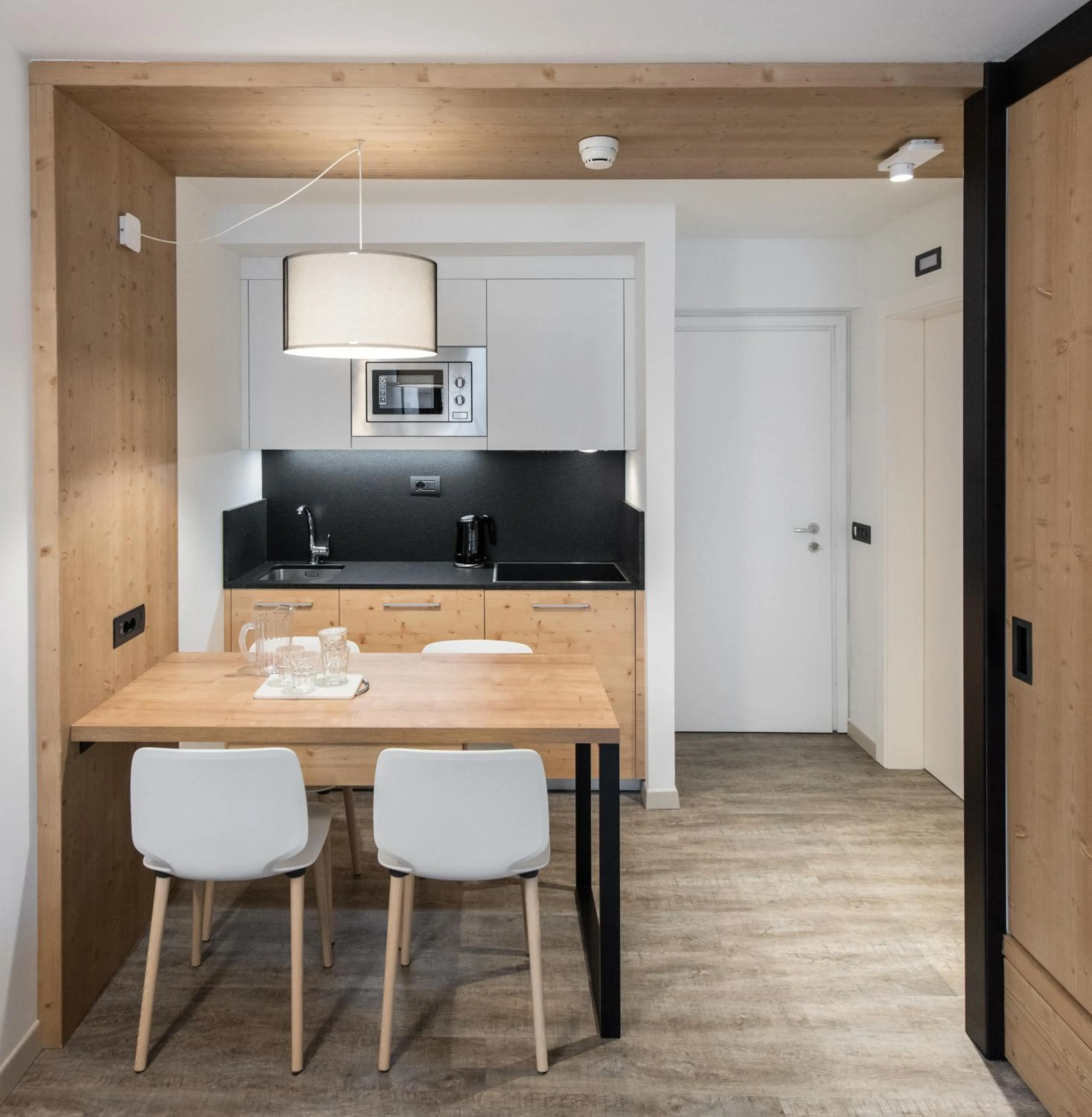Kitchen or kitchenette in Ambiez Residencehotel