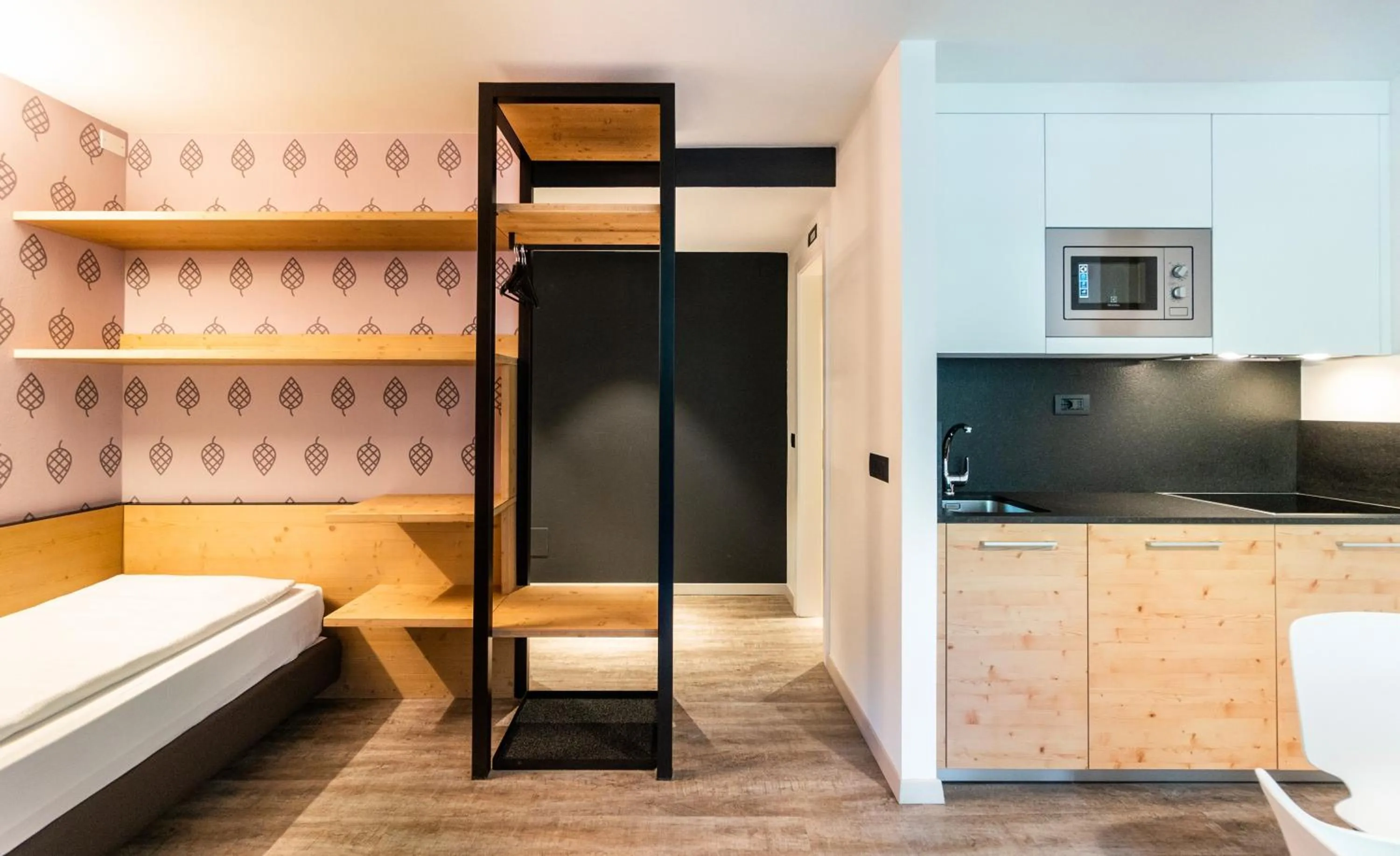 Kitchen or kitchenette, Bed in Ambiez Residencehotel