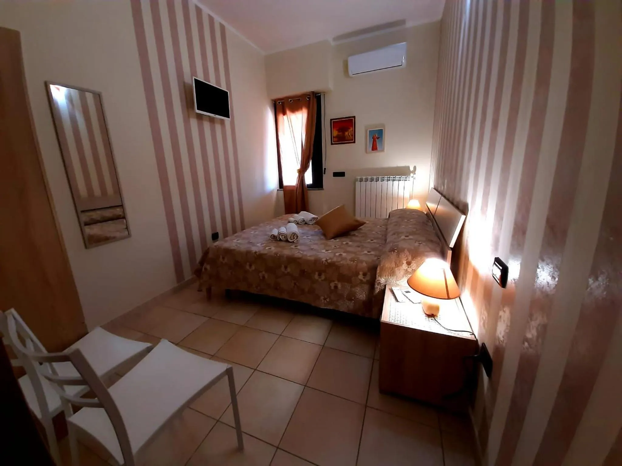 Bedroom, Bed in B&b Villa Santa Sofia by holidayngo