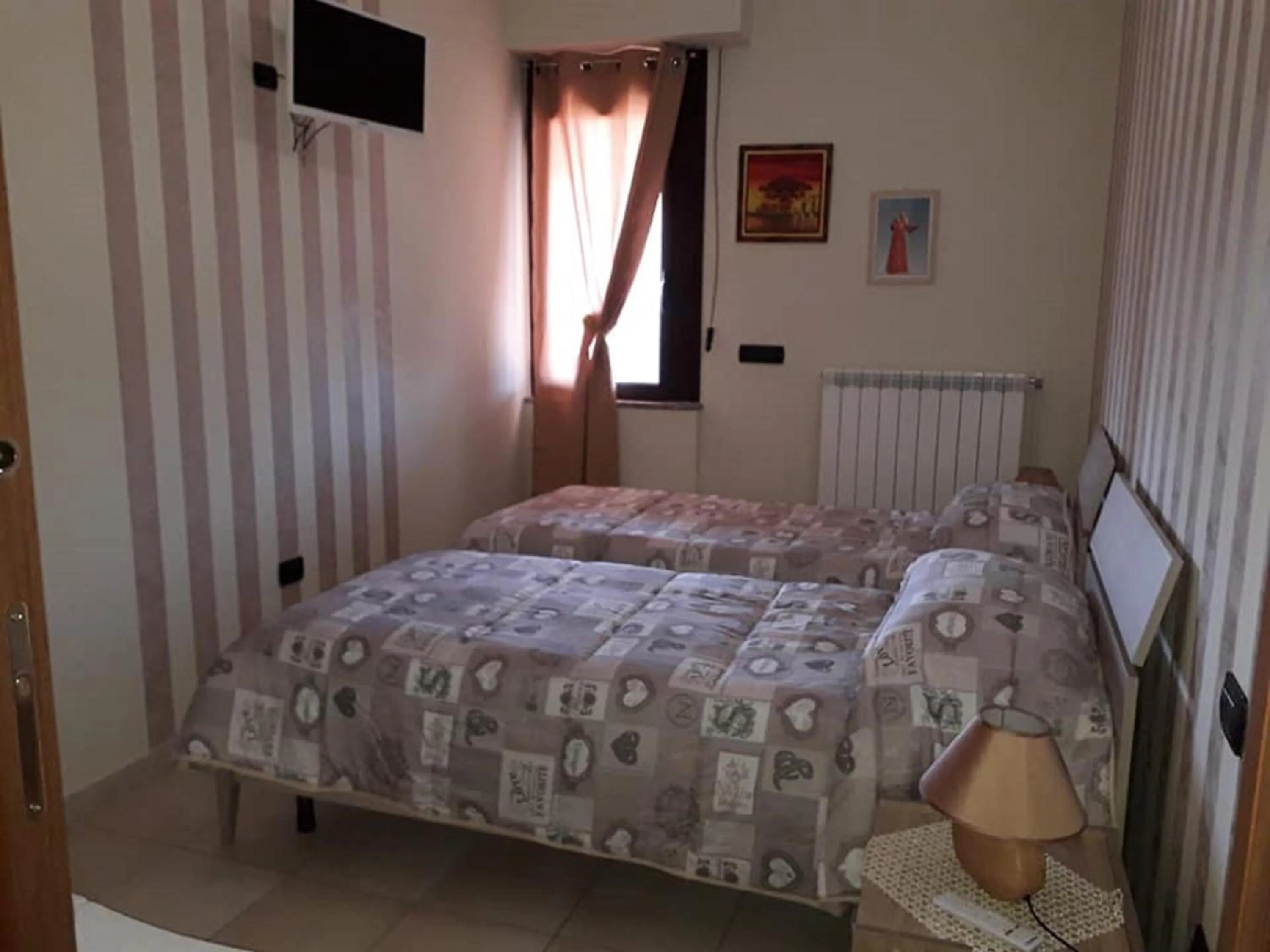 Bed in B&b Villa Santa Sofia by holidayngo