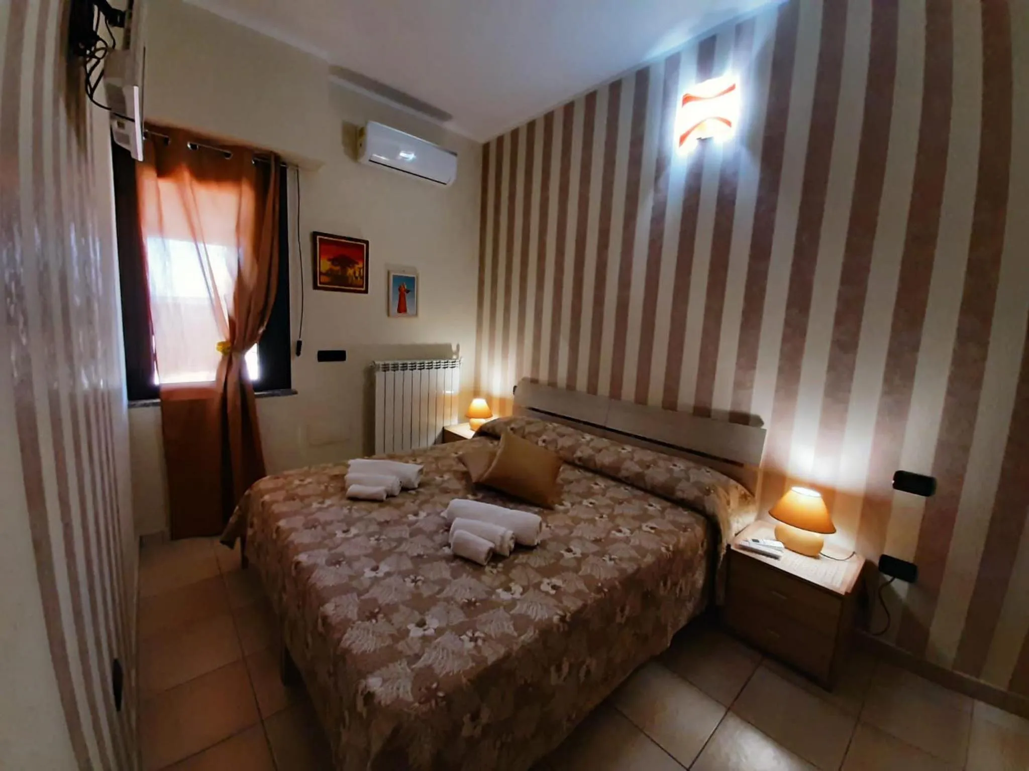 Bedroom, Bed in B&b Villa Santa Sofia by holidayngo