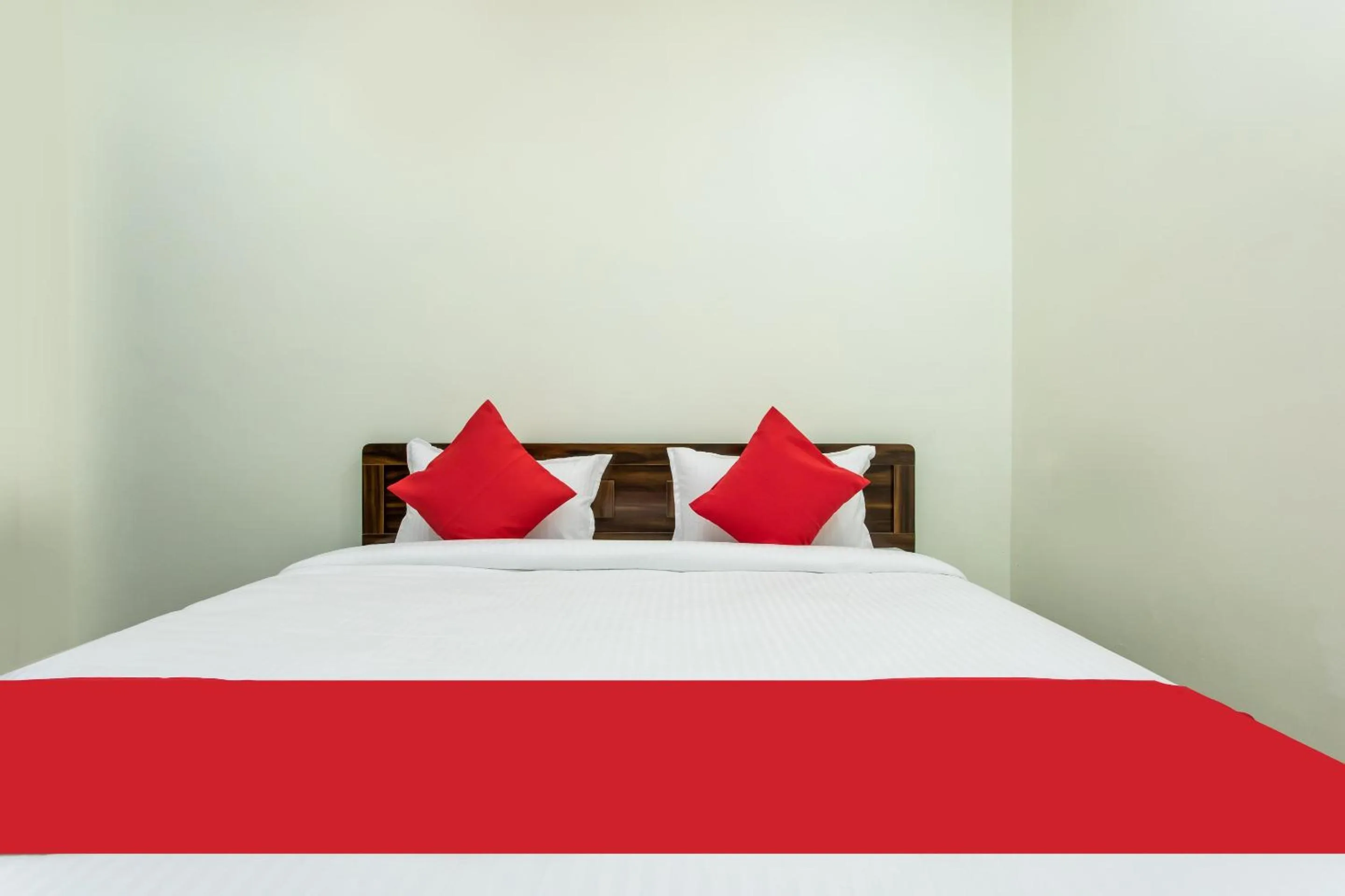 Bedroom in Hotel O Manjulam Regency