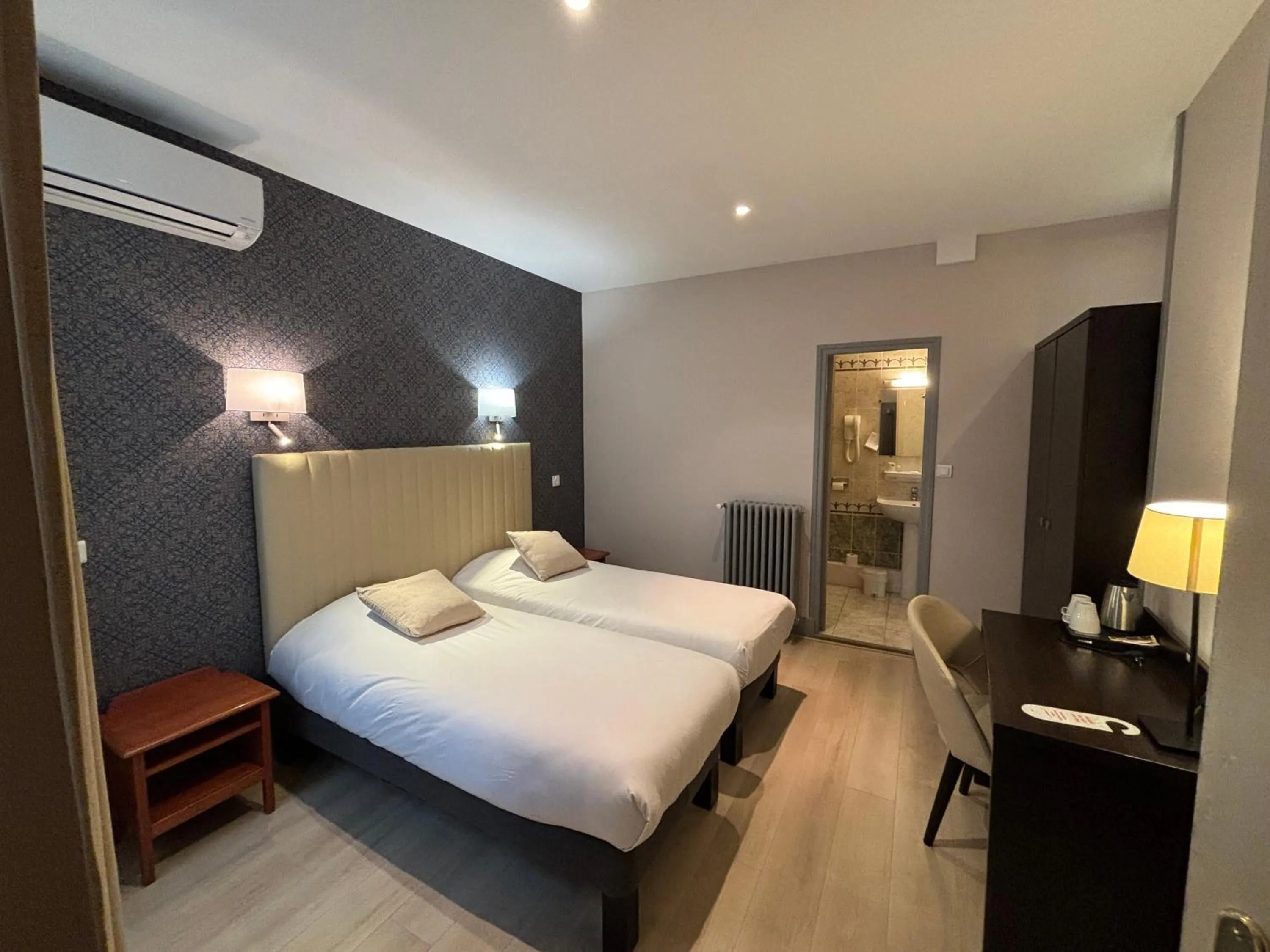 Bed in Hotel Le Jacquemart