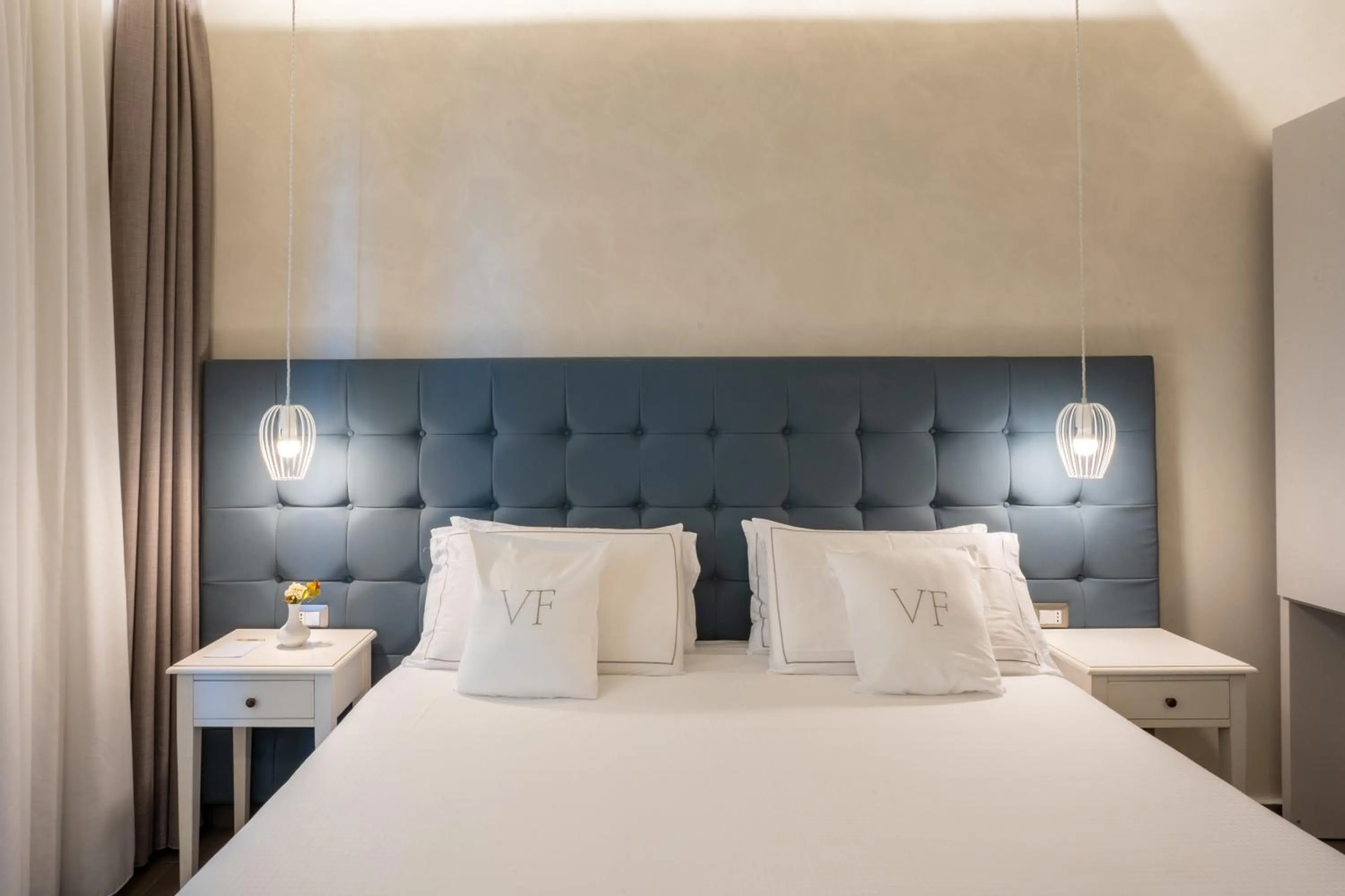 Bed in Villa Fiorita Boutique Hotel