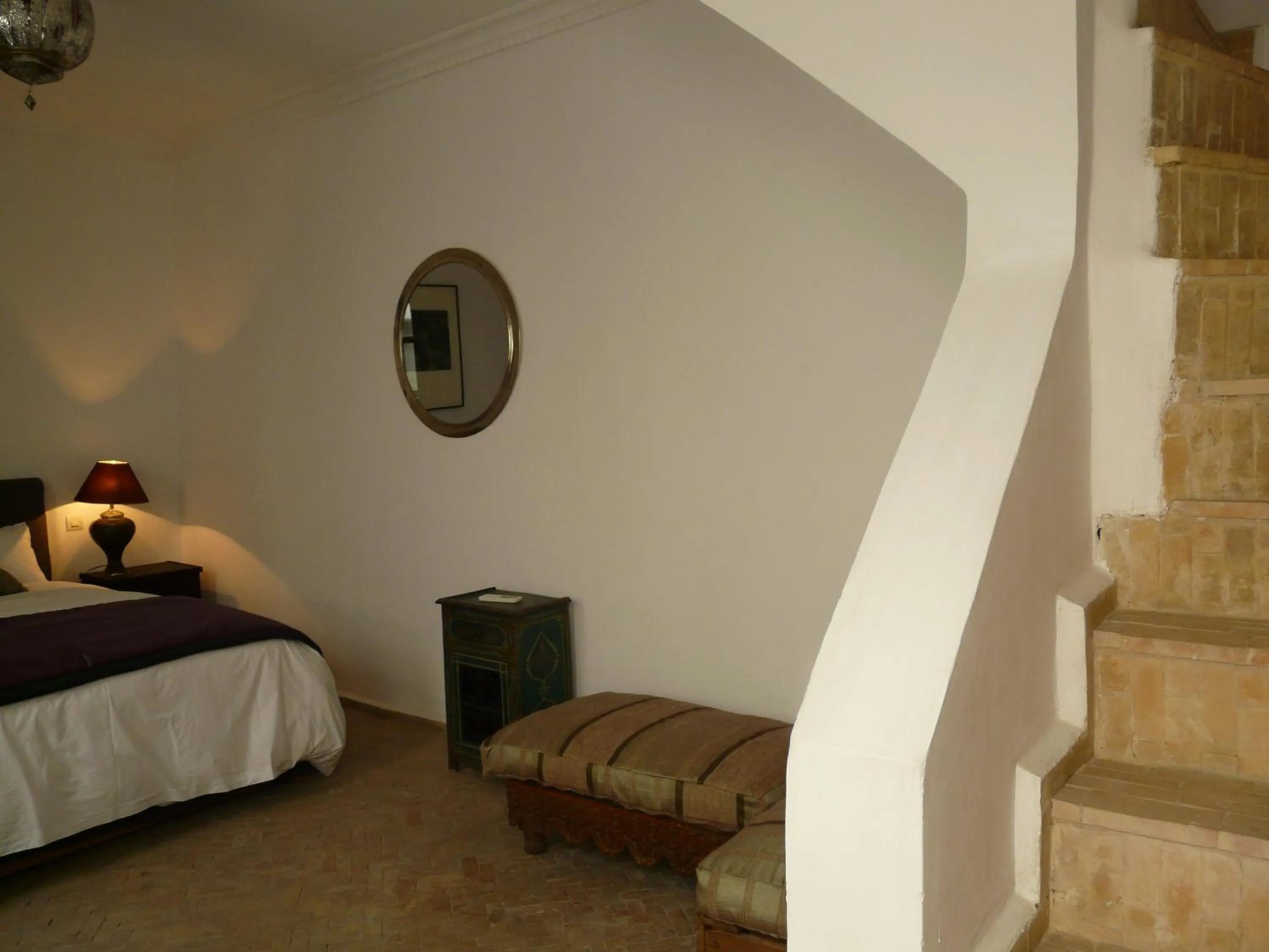 Seating area, Bed in Riad Capaldi