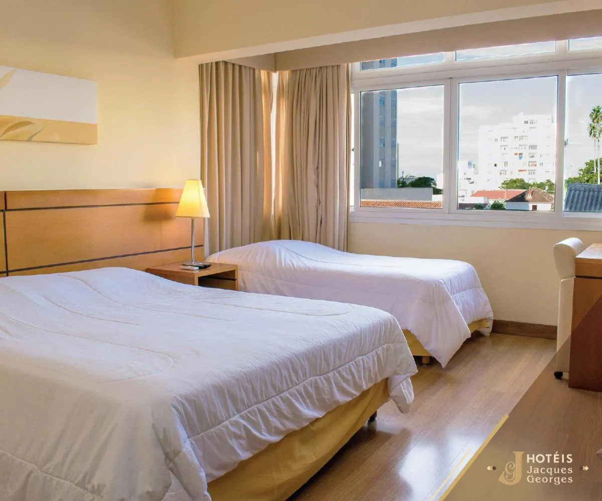 Bed in Hotel Jacques Georges Business