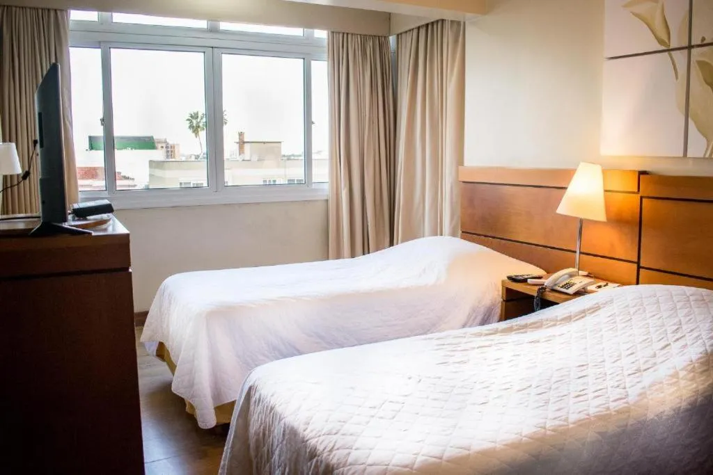 Bed in Hotel Jacques Georges Business