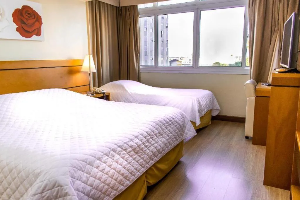 Bed in Hotel Jacques Georges Business