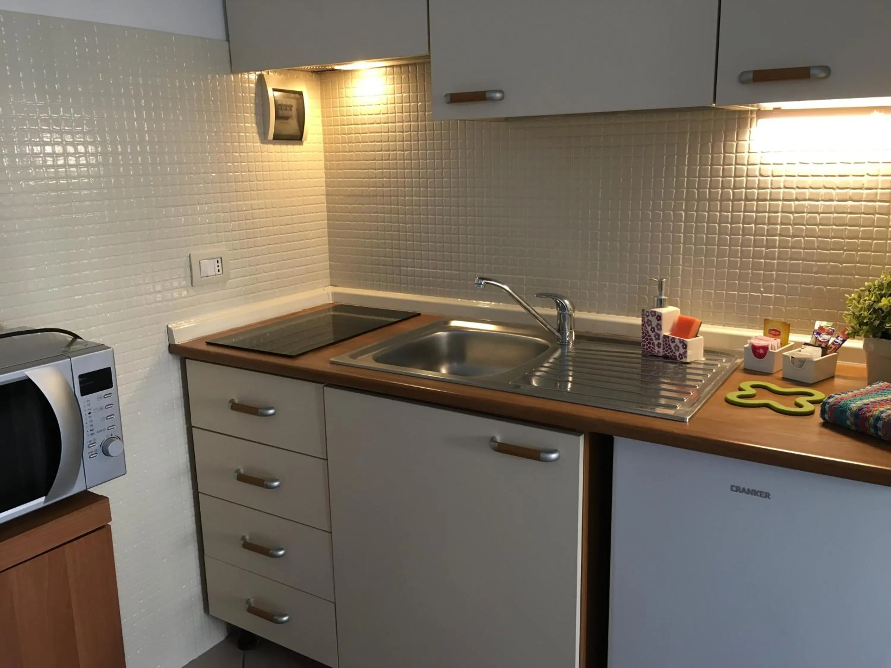 Kitchen or kitchenette in Residence Gloria