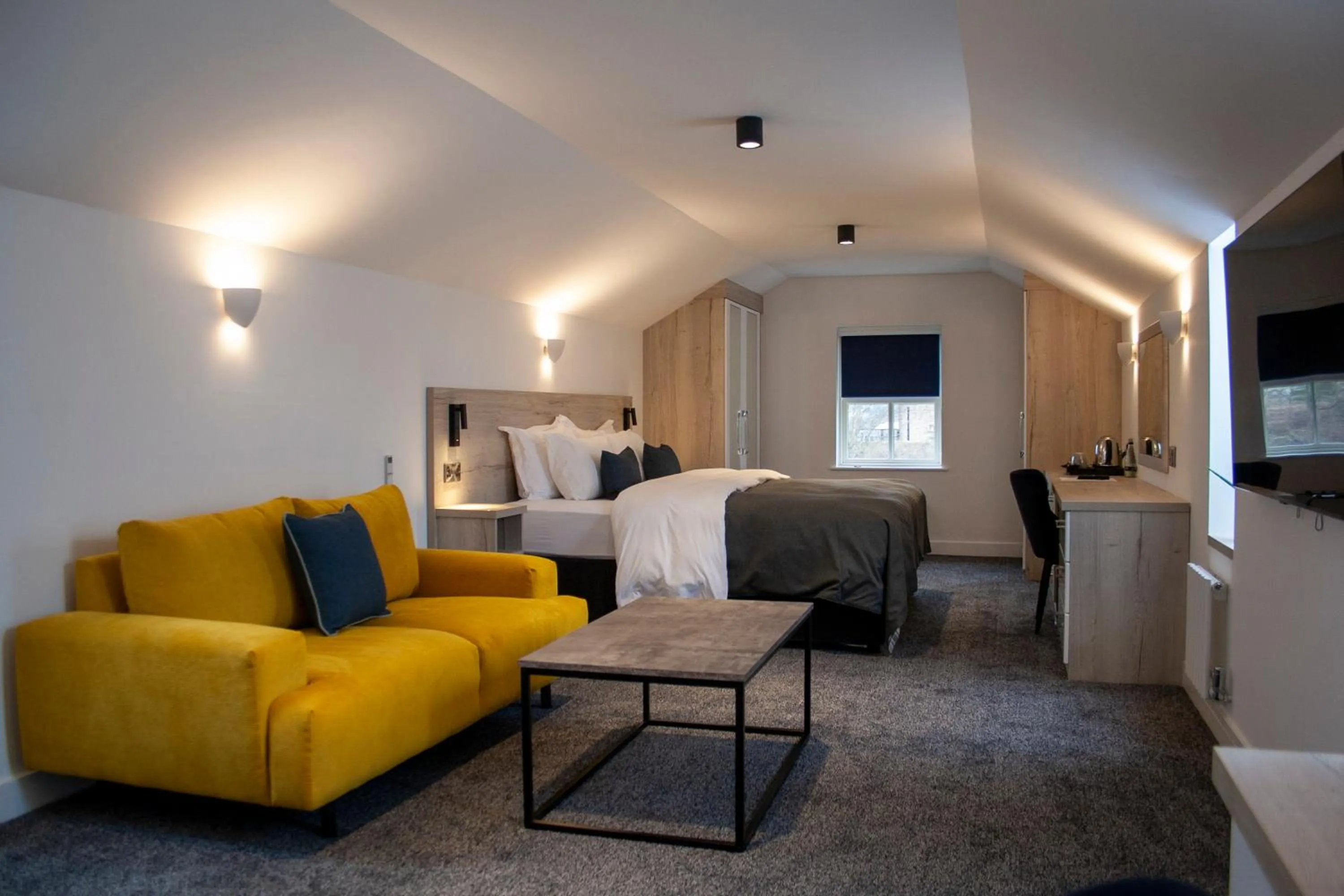 Bed in The Craven Heifer Inn