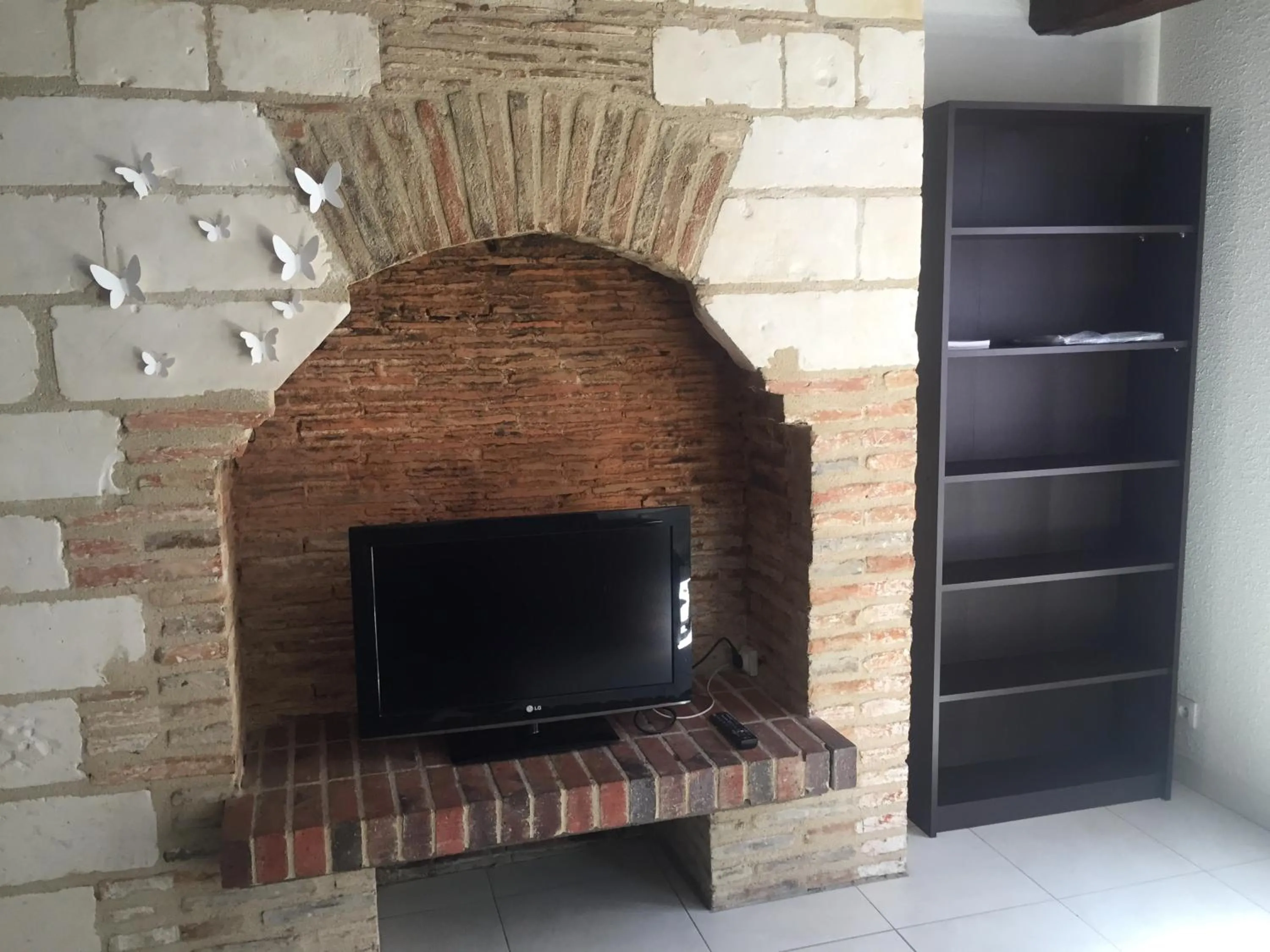 Communal lounge/ TV room in Le Charmant Zola Hyper Centre classé