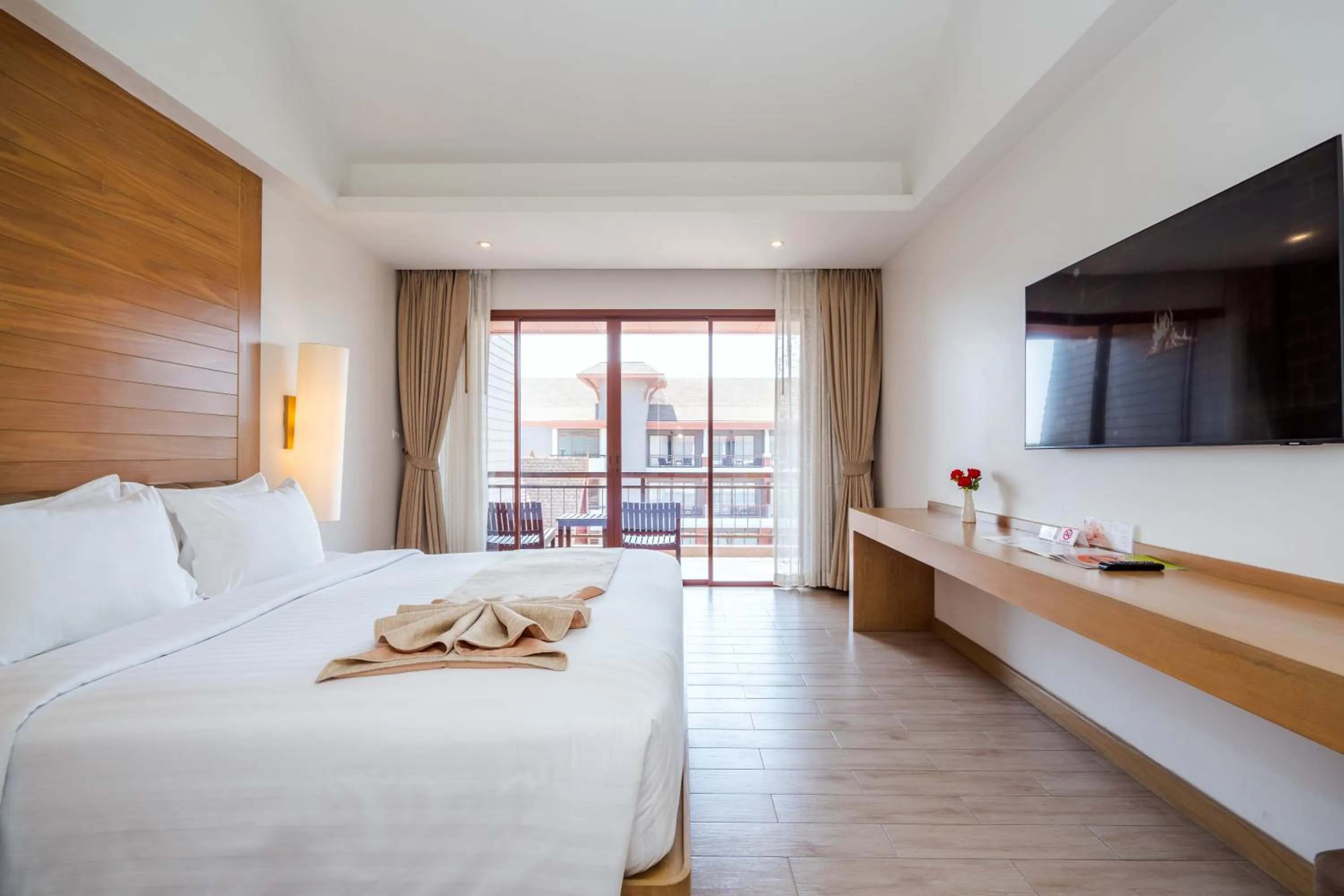 Bed in Ayrest Hua Hin Hotel