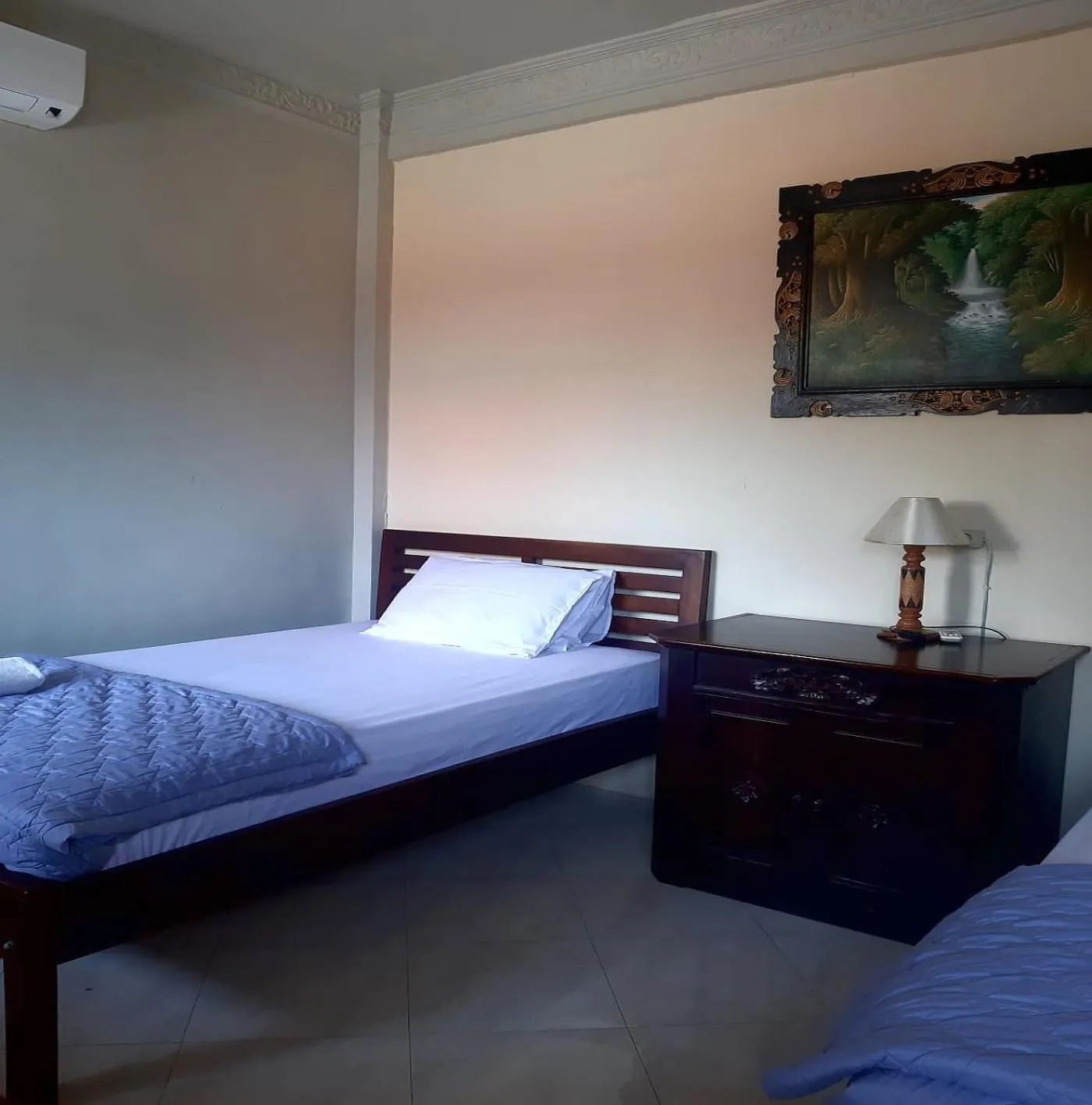 Bed in The Reinhold Guesthouse Bali