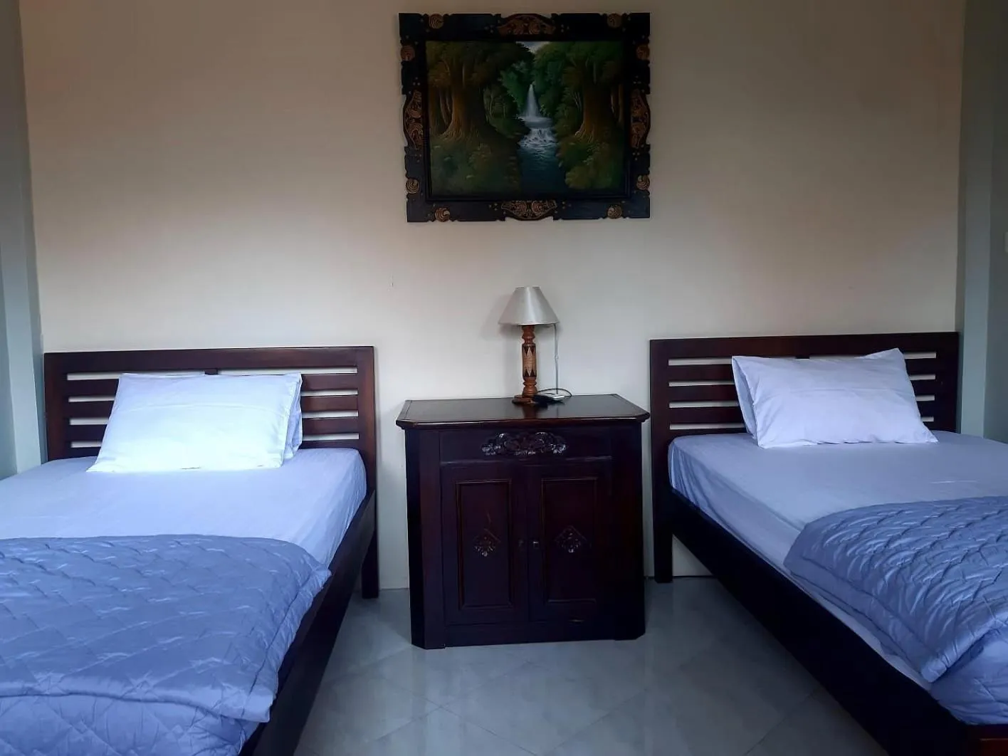 Photo of the whole room, Bed in The Reinhold Guesthouse Bali