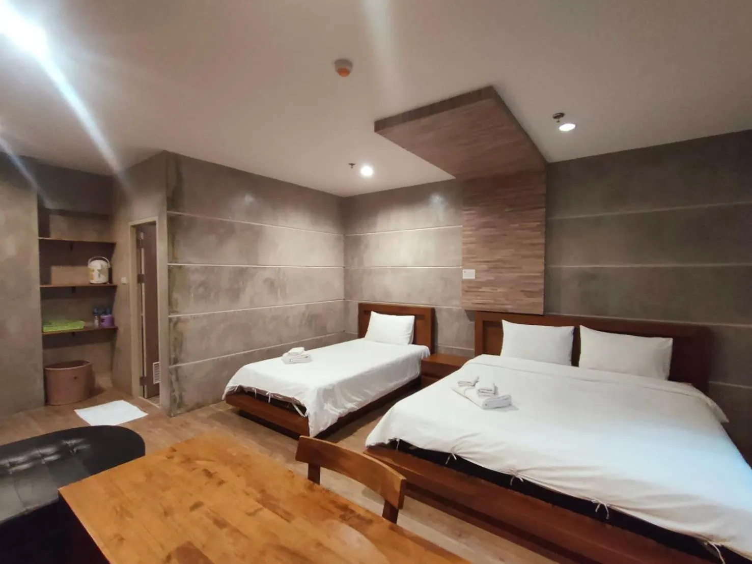 Bed in Komol Residence Bangkok