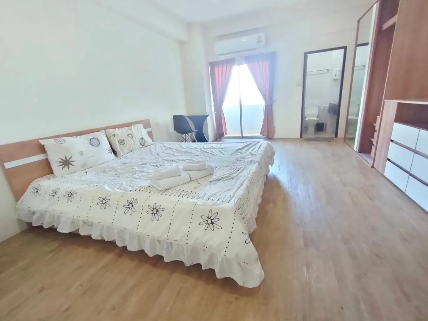 Bed in Komol Residence Bangkok