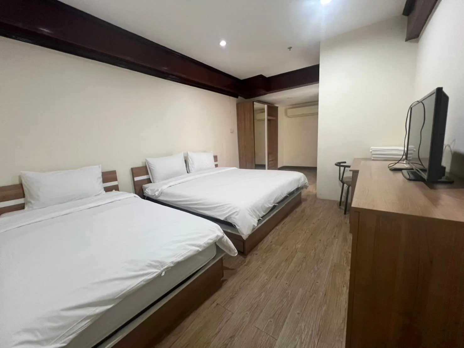 Bed in Komol Residence Bangkok