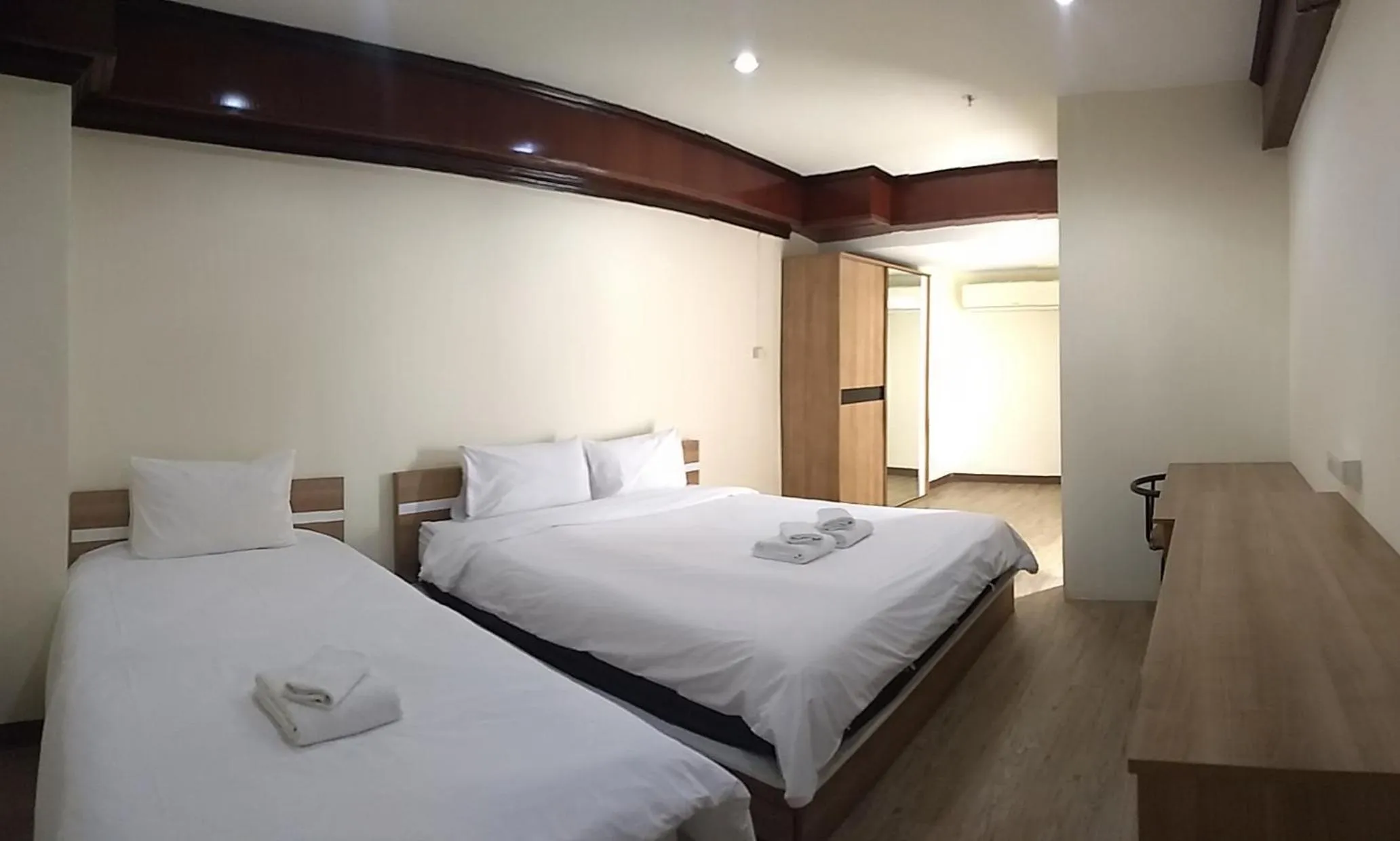 Bed in Komol Residence Bangkok