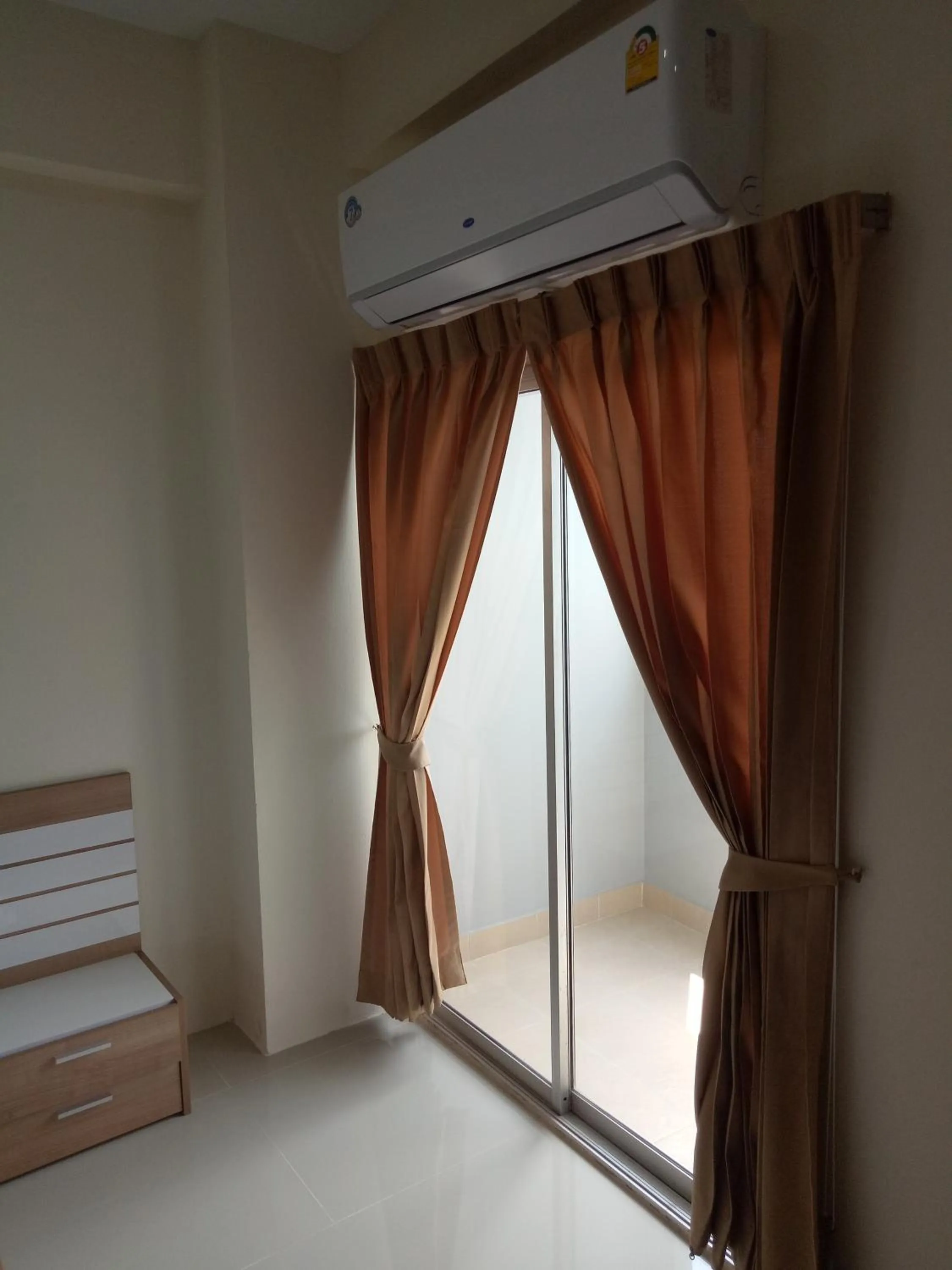 Bed in Komol Residence Bangkok