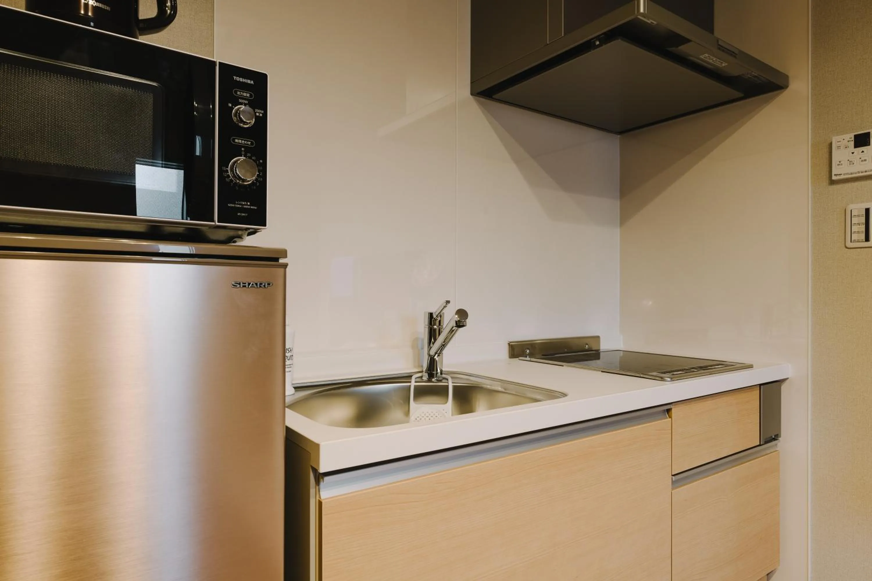 Kitchen or kitchenette in GRAND BASE Karatsu Ekiminami