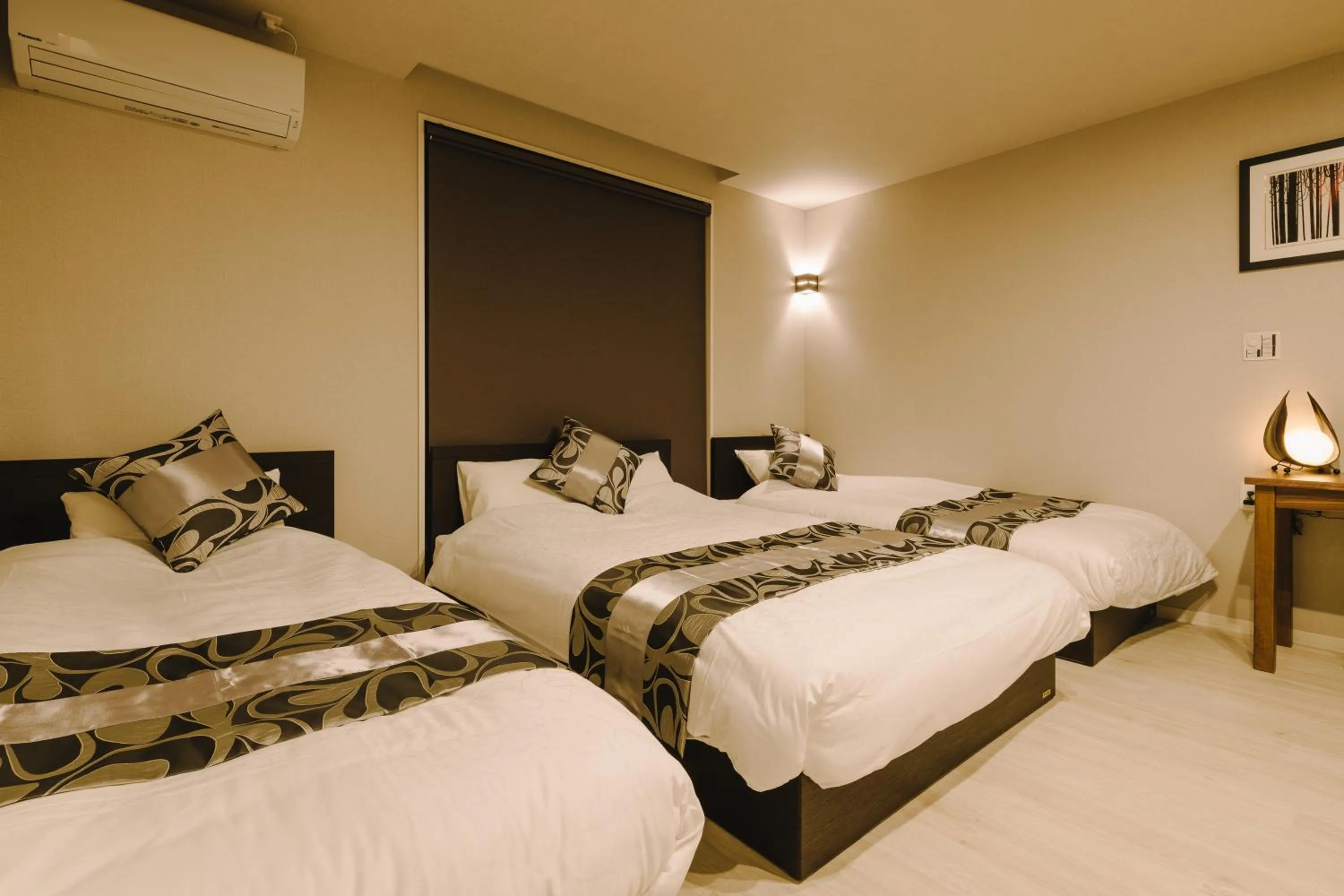 Bed in GRAND BASE Karatsu Ekiminami