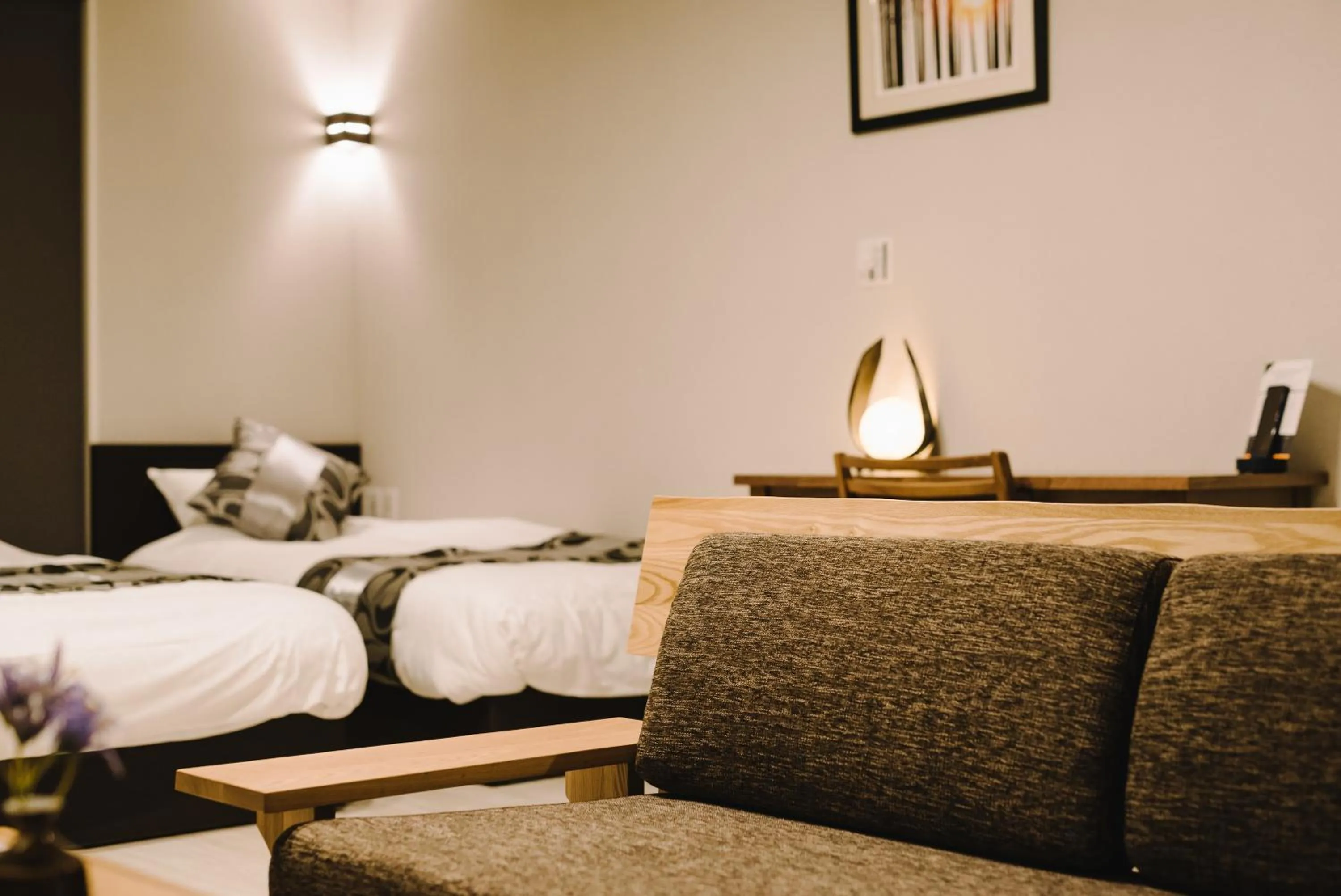 Photo of the whole room, Bed in GRAND BASE Karatsu Ekiminami