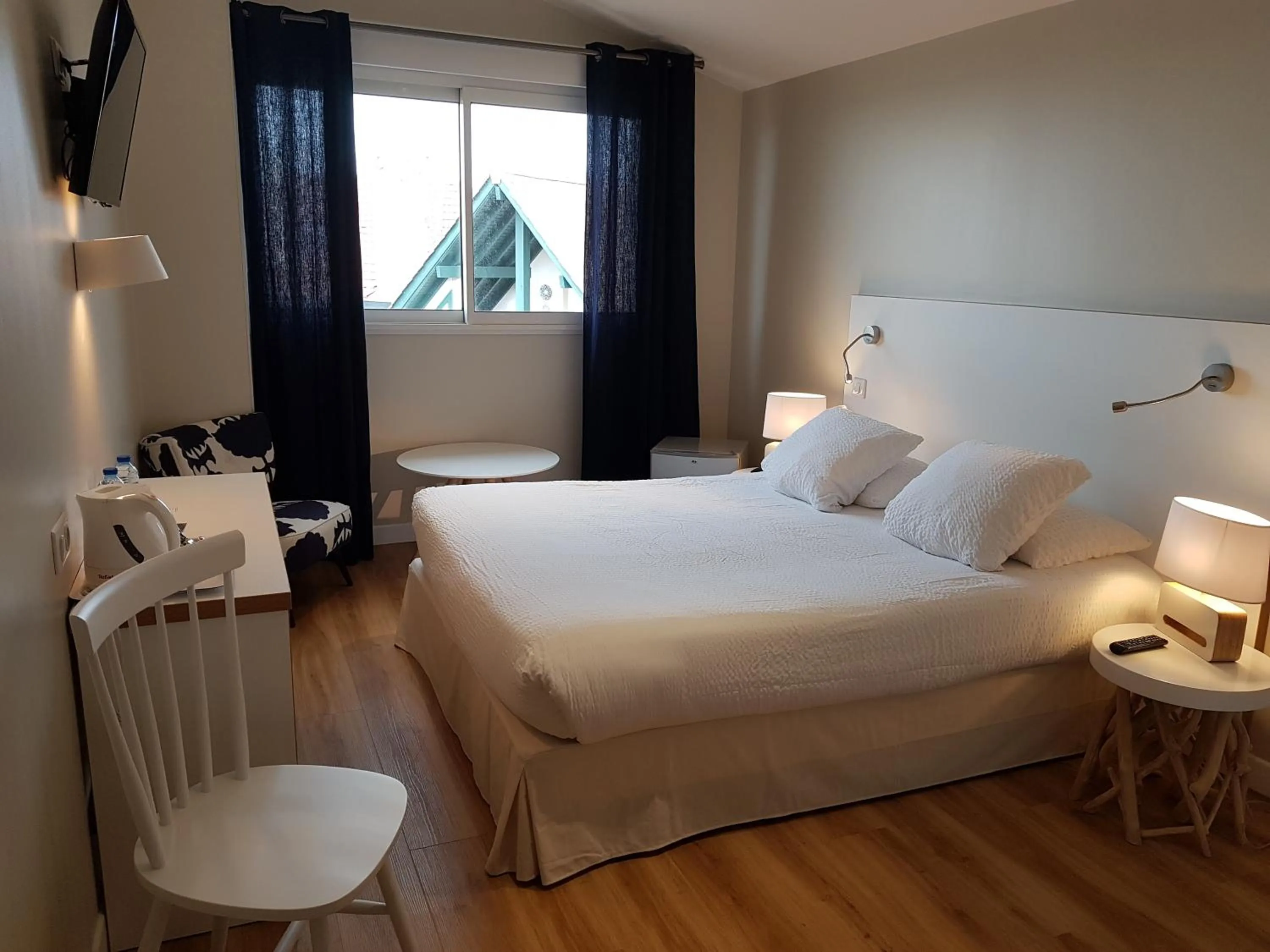 Photo of the whole room, Bed in Hôtel Au Bon Coin