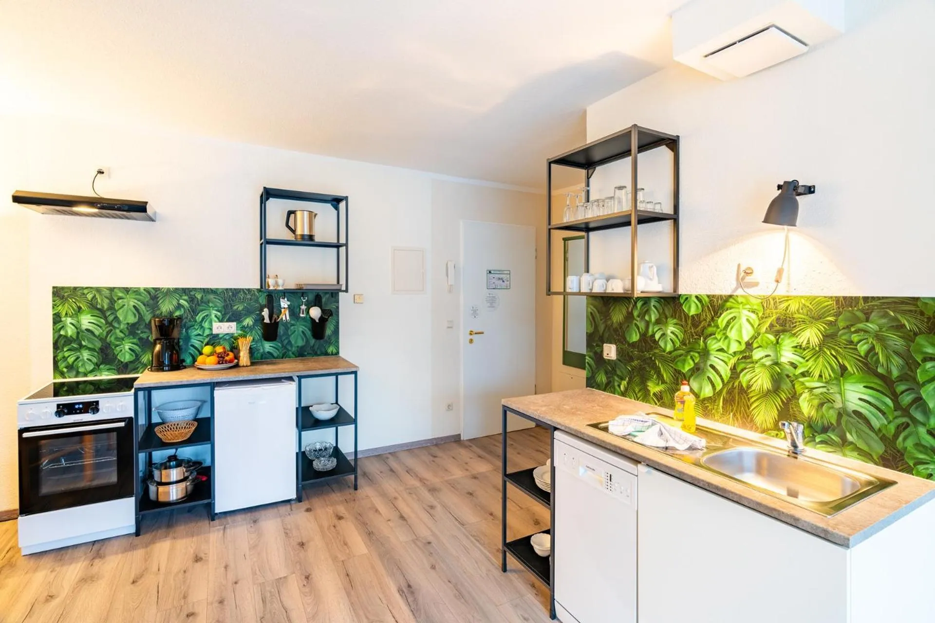 Kitchen or kitchenette in Aparthotel Tropenhaus Bansin