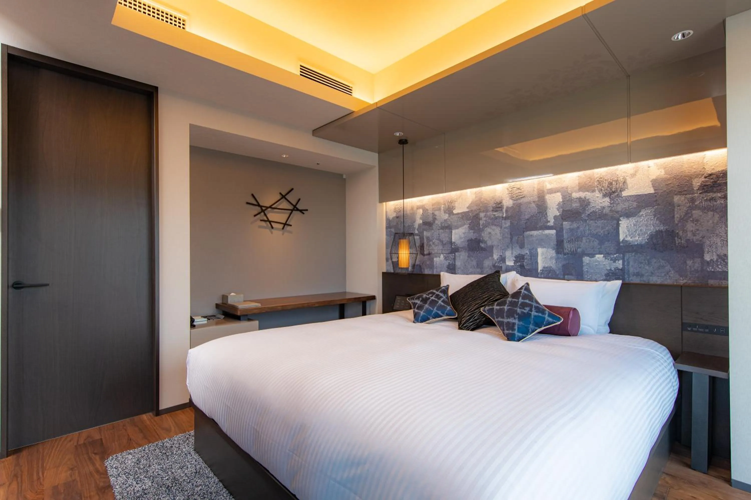 Bed in THE BLOSSOM HIBIYA