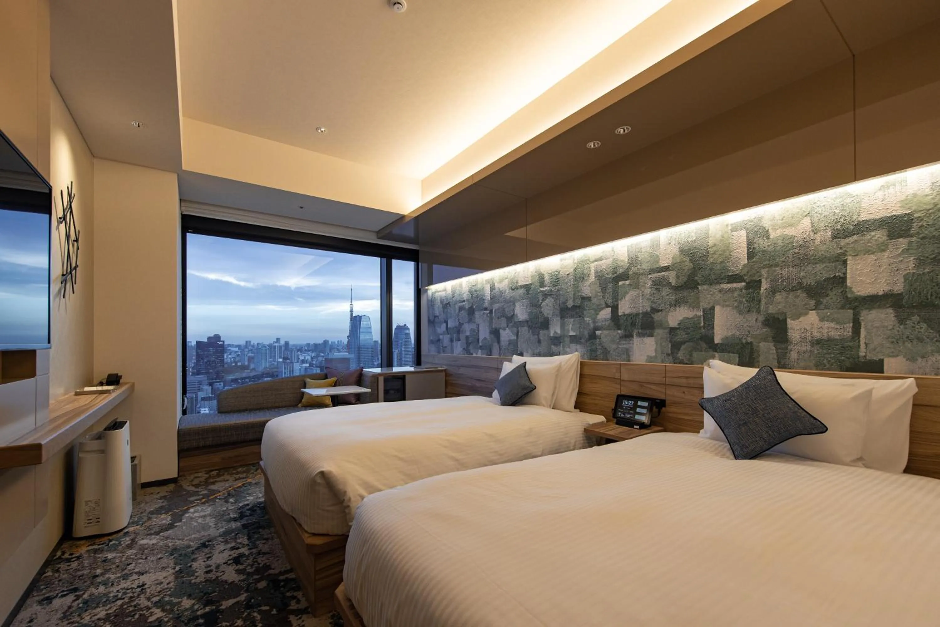 Bed in THE BLOSSOM HIBIYA