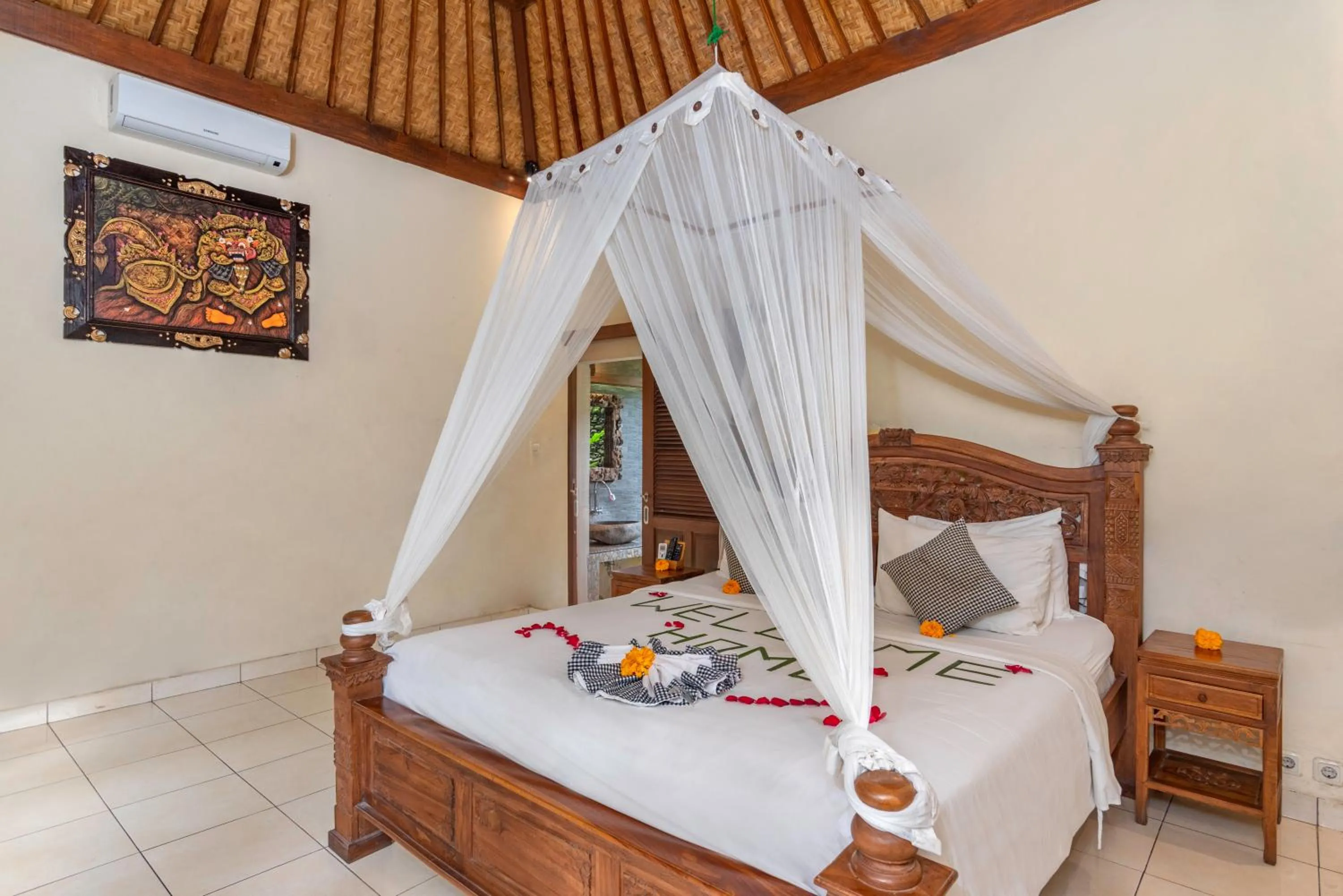 Bed in The Alus Cottage and Villa