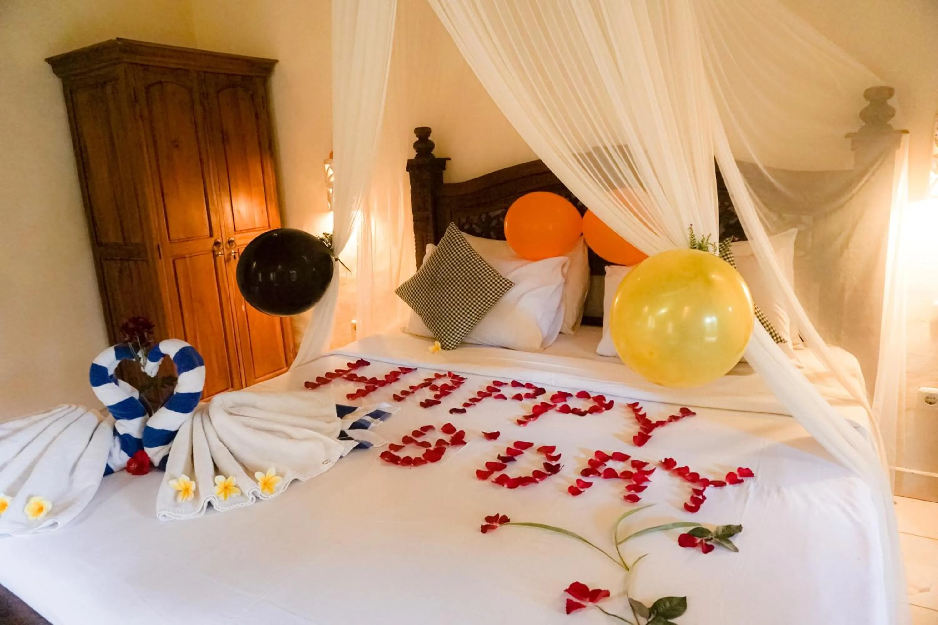 Bed in The Alus Cottage and Villa