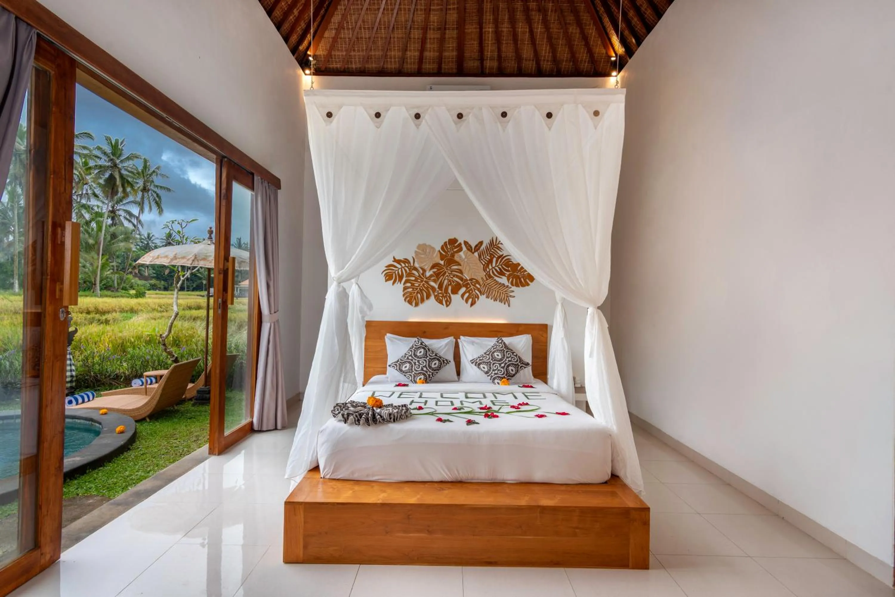 Bed in The Alus Cottage and Villa