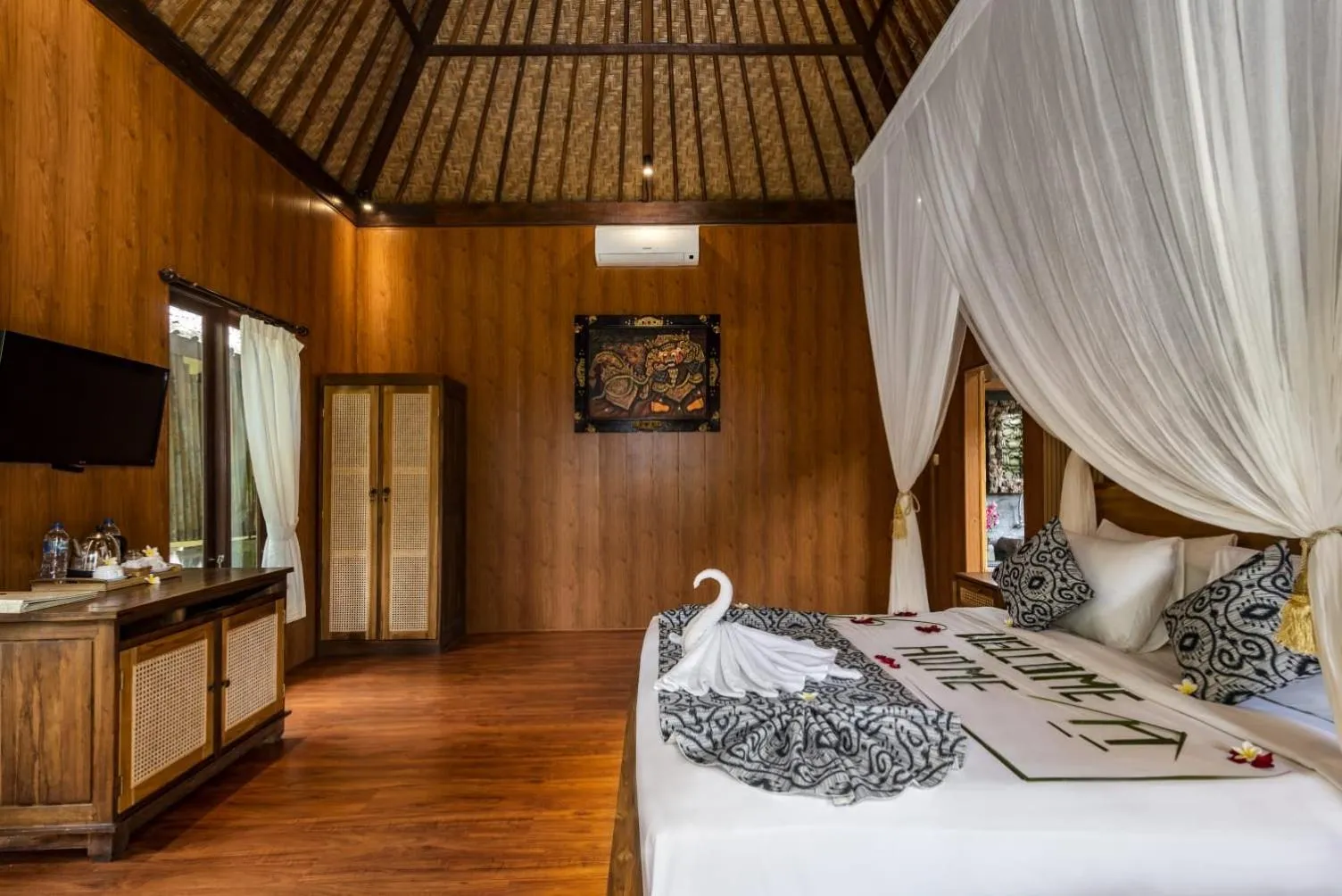 Bed in The Alus Cottage and Villa