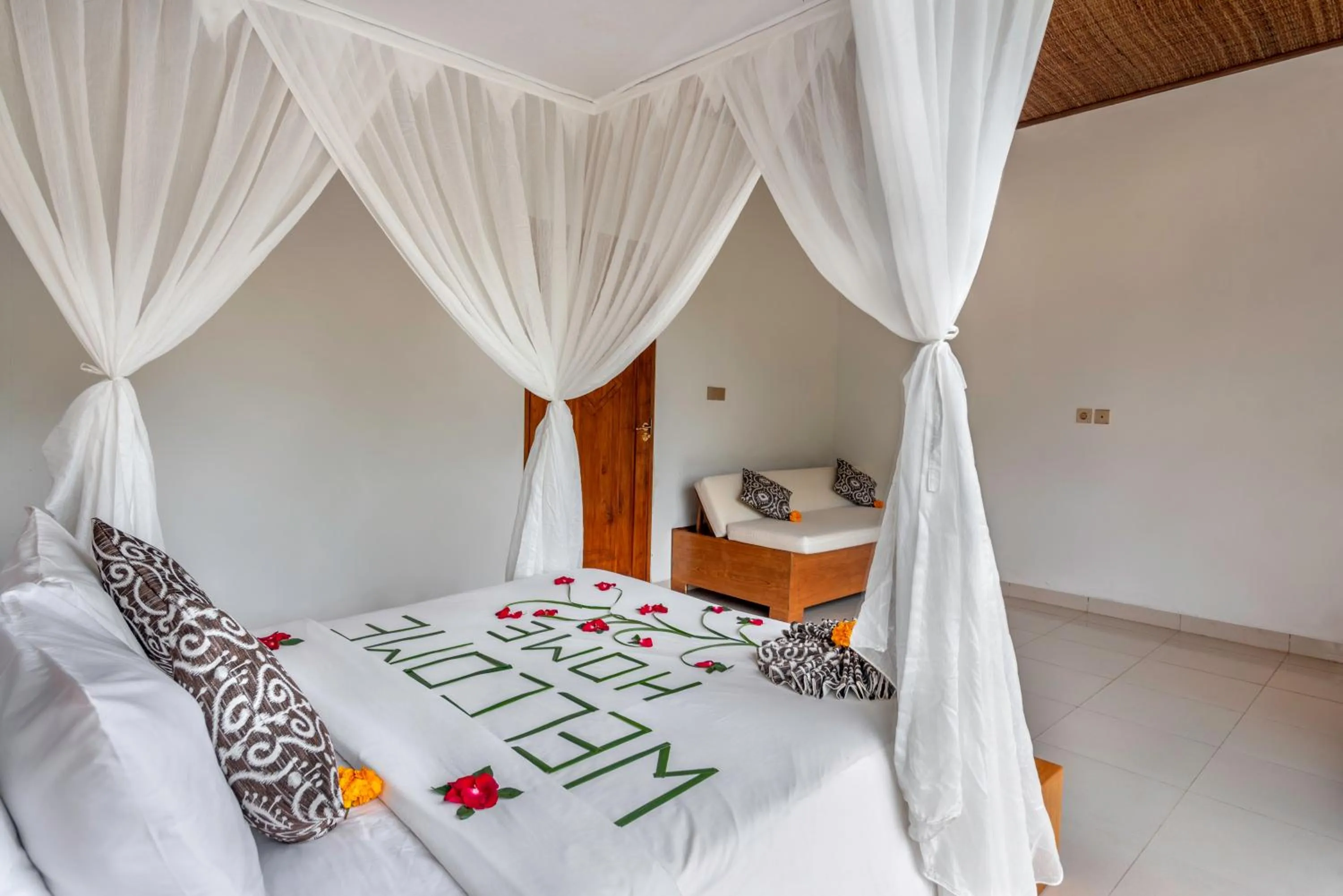 Bed in The Alus Cottage and Villa