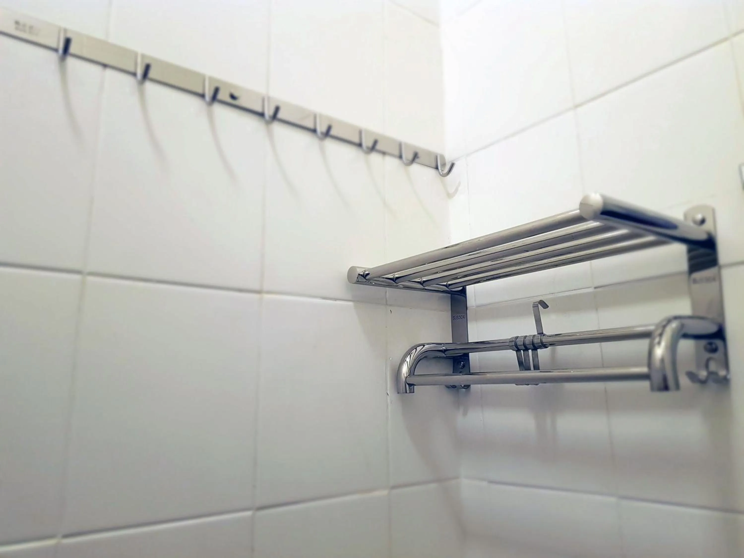 Toilet in Tas 96 Inn