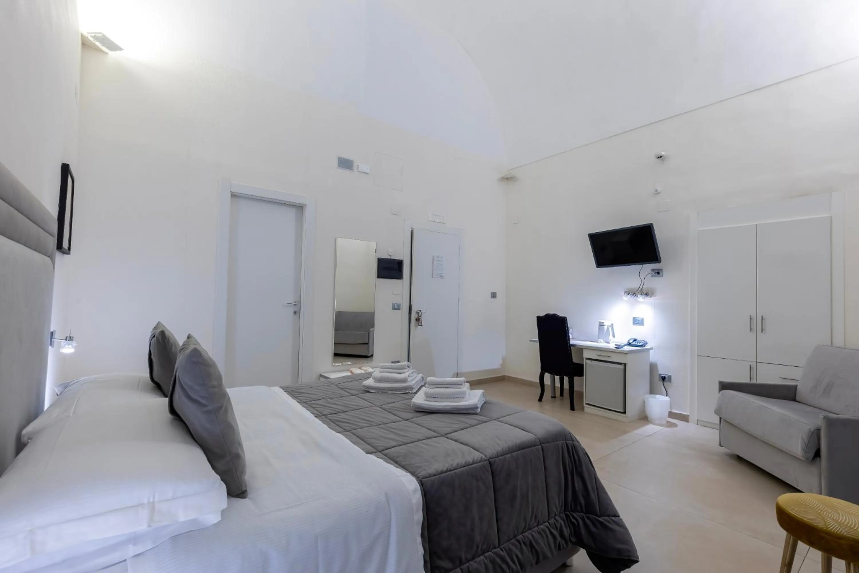 Bed in Il Tesoro Smart Suite & SPA