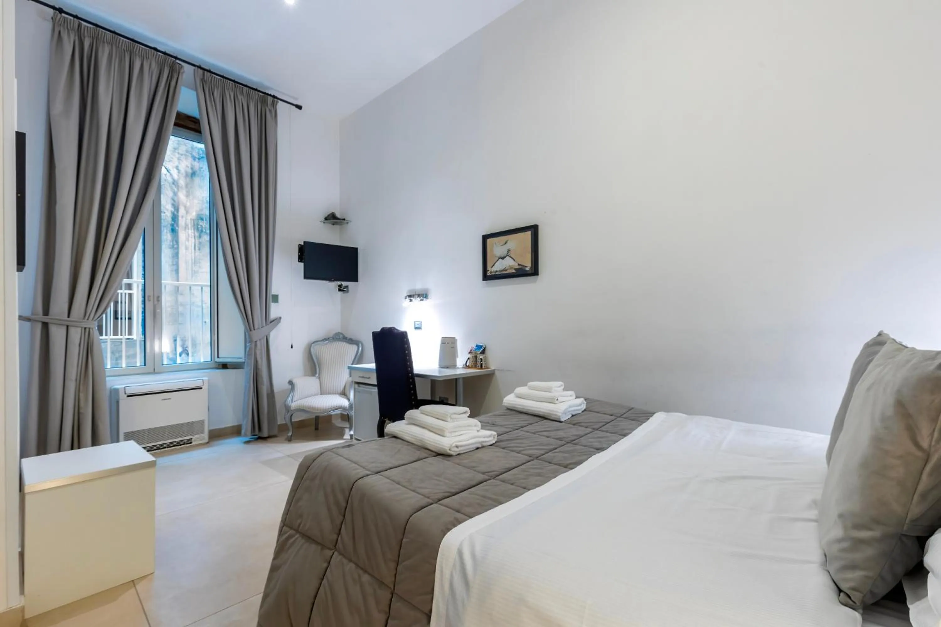 Bed in Il Tesoro Smart Suite & SPA