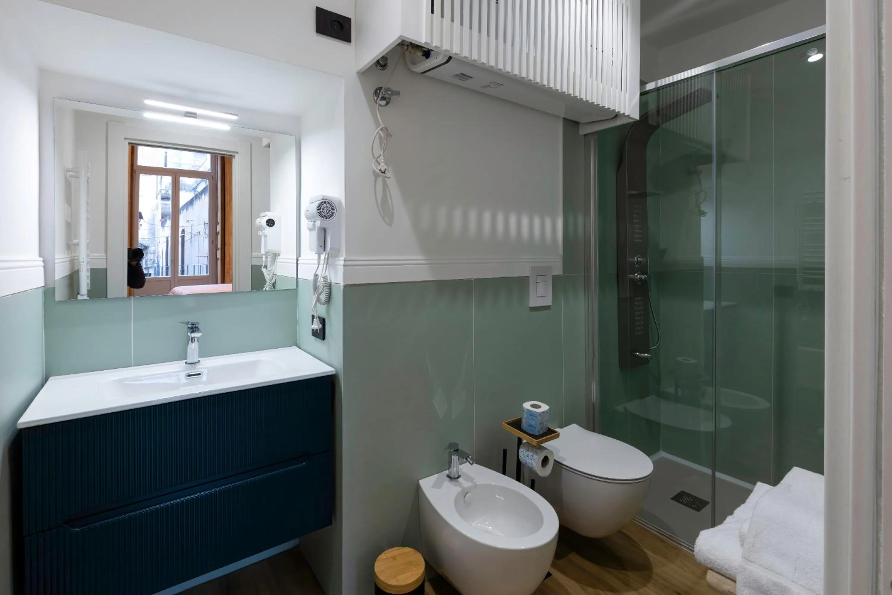 Bathroom in Il Tesoro Smart Suite & SPA