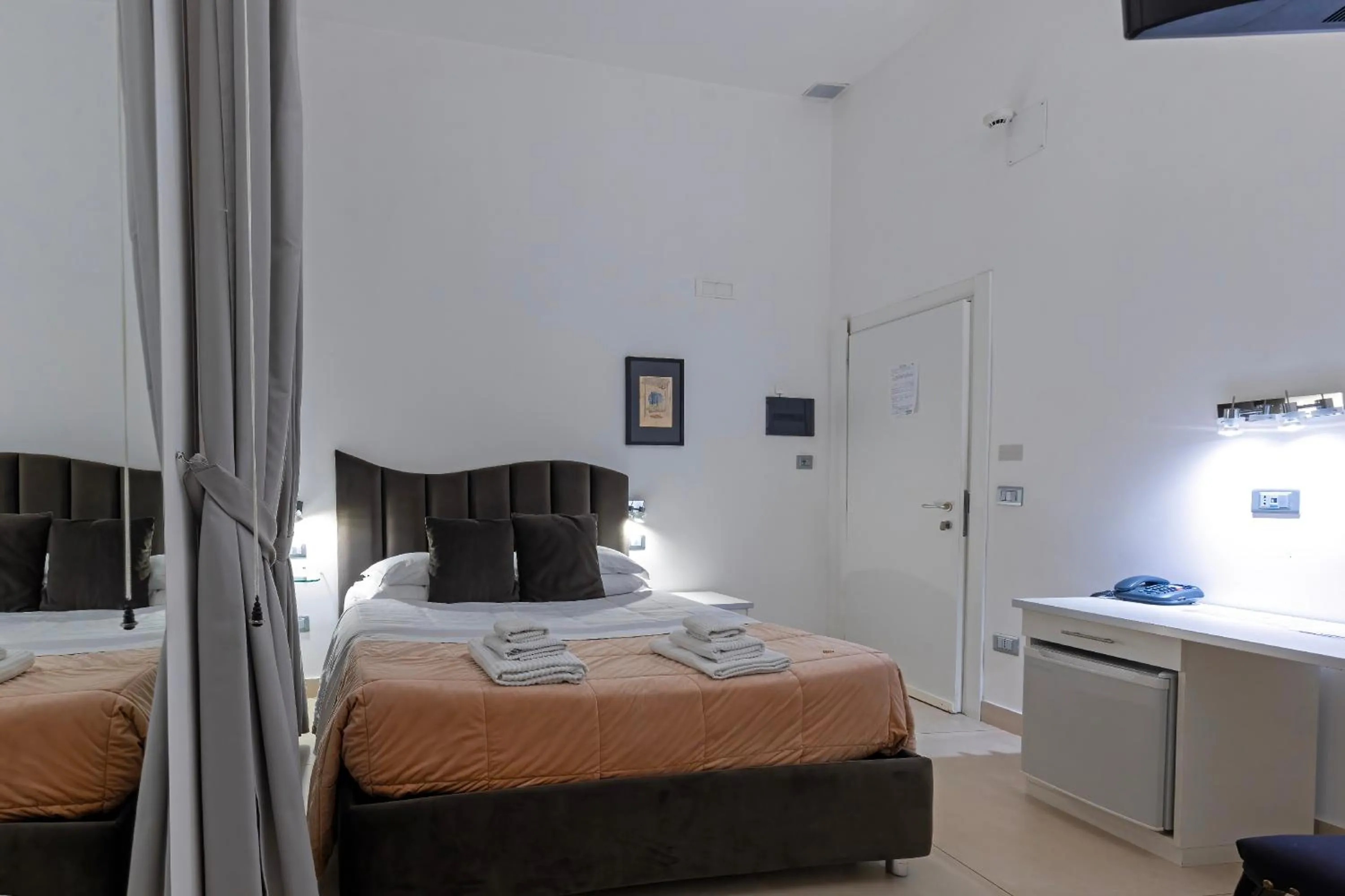 Bed in Il Tesoro Smart Suite & SPA