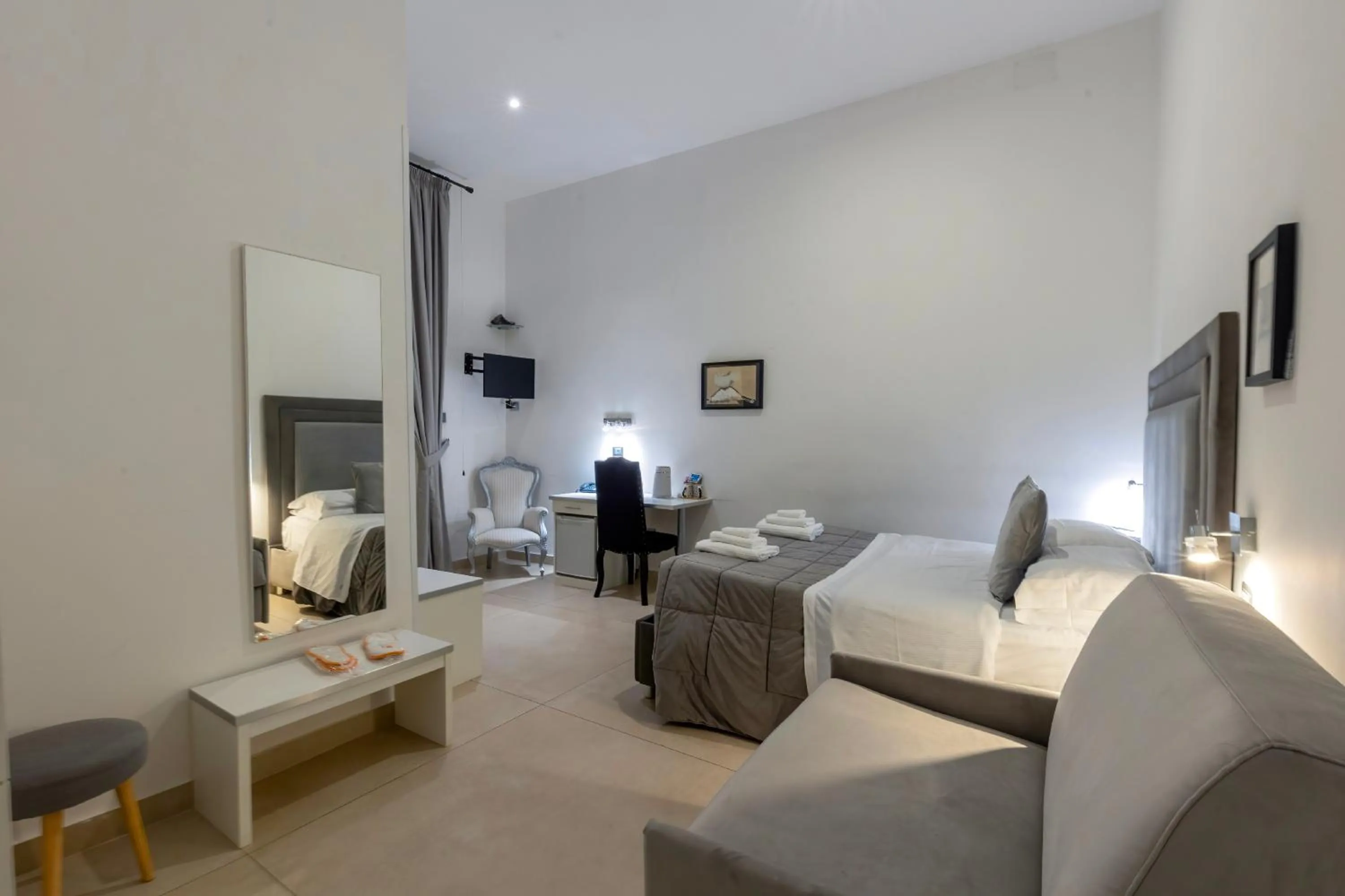 Bed in Il Tesoro Smart Suite & SPA