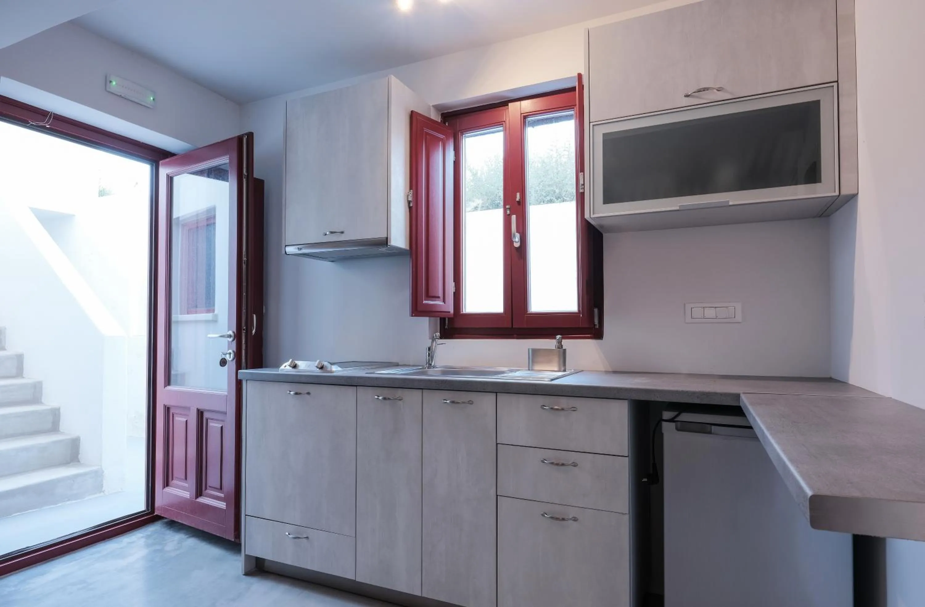 Kitchen or kitchenette in Aplada Suites