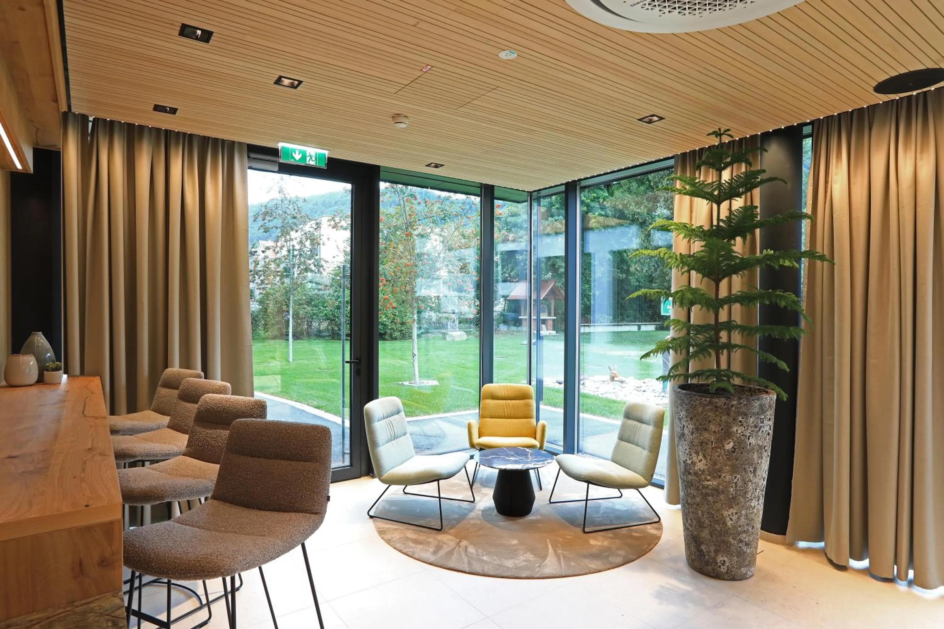 Seating area in Hotel Steiermarkhof Graz - Aus Holz gebaut, von Hügeln geküsst