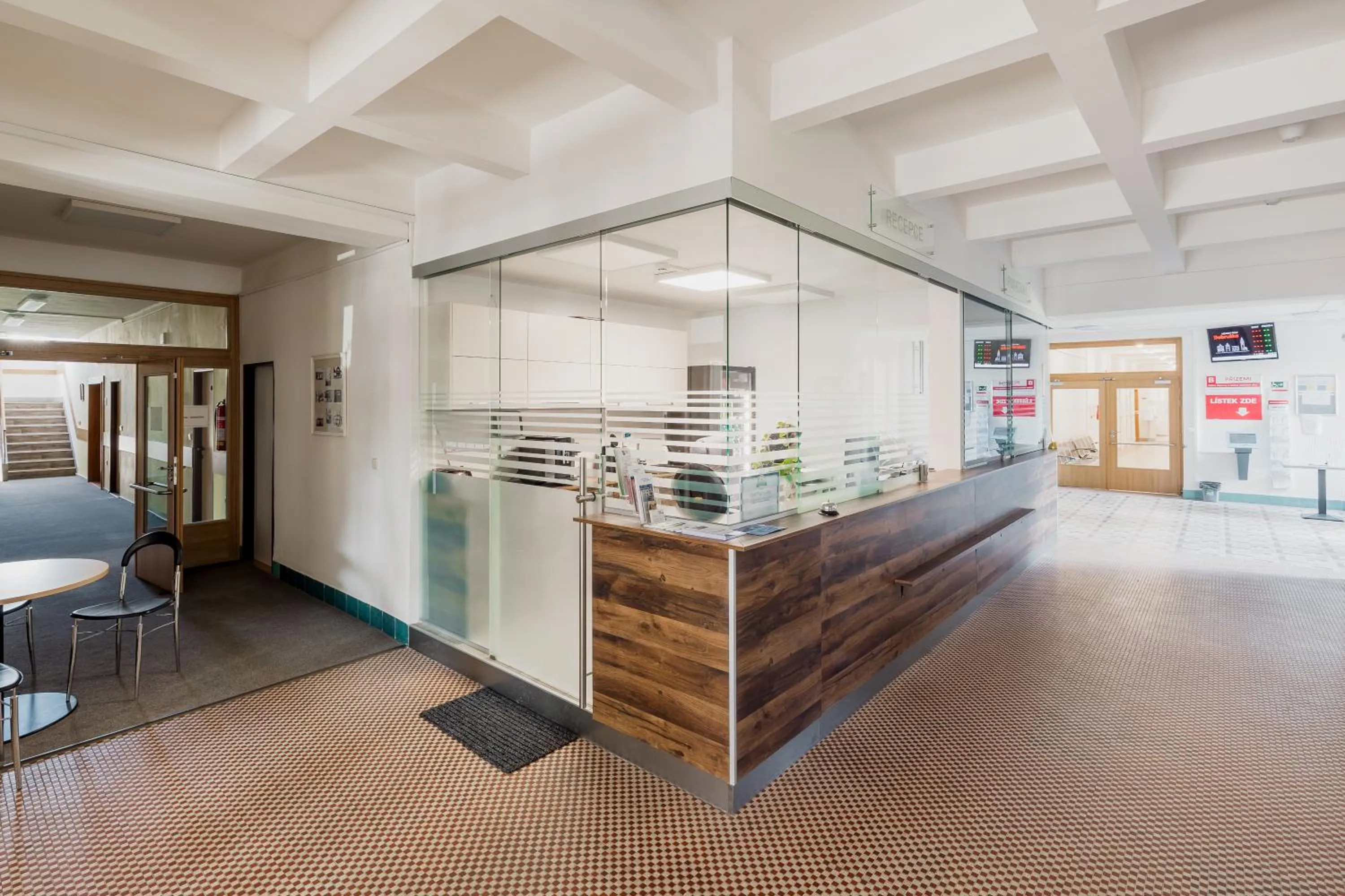 Lobby or reception in hotel Dobruška