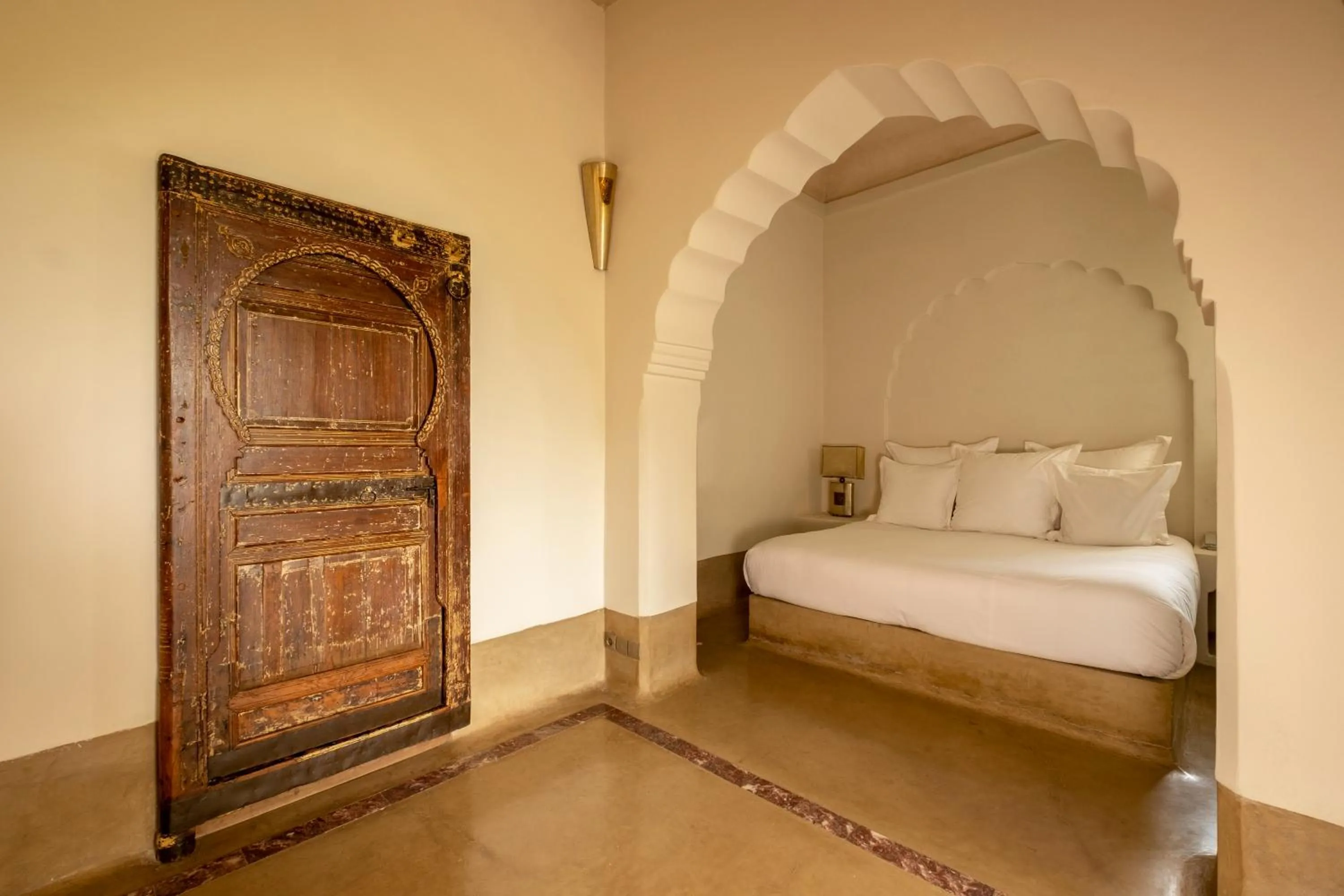 Bed in Ksar Char-Bagh Small Luxury Hotels