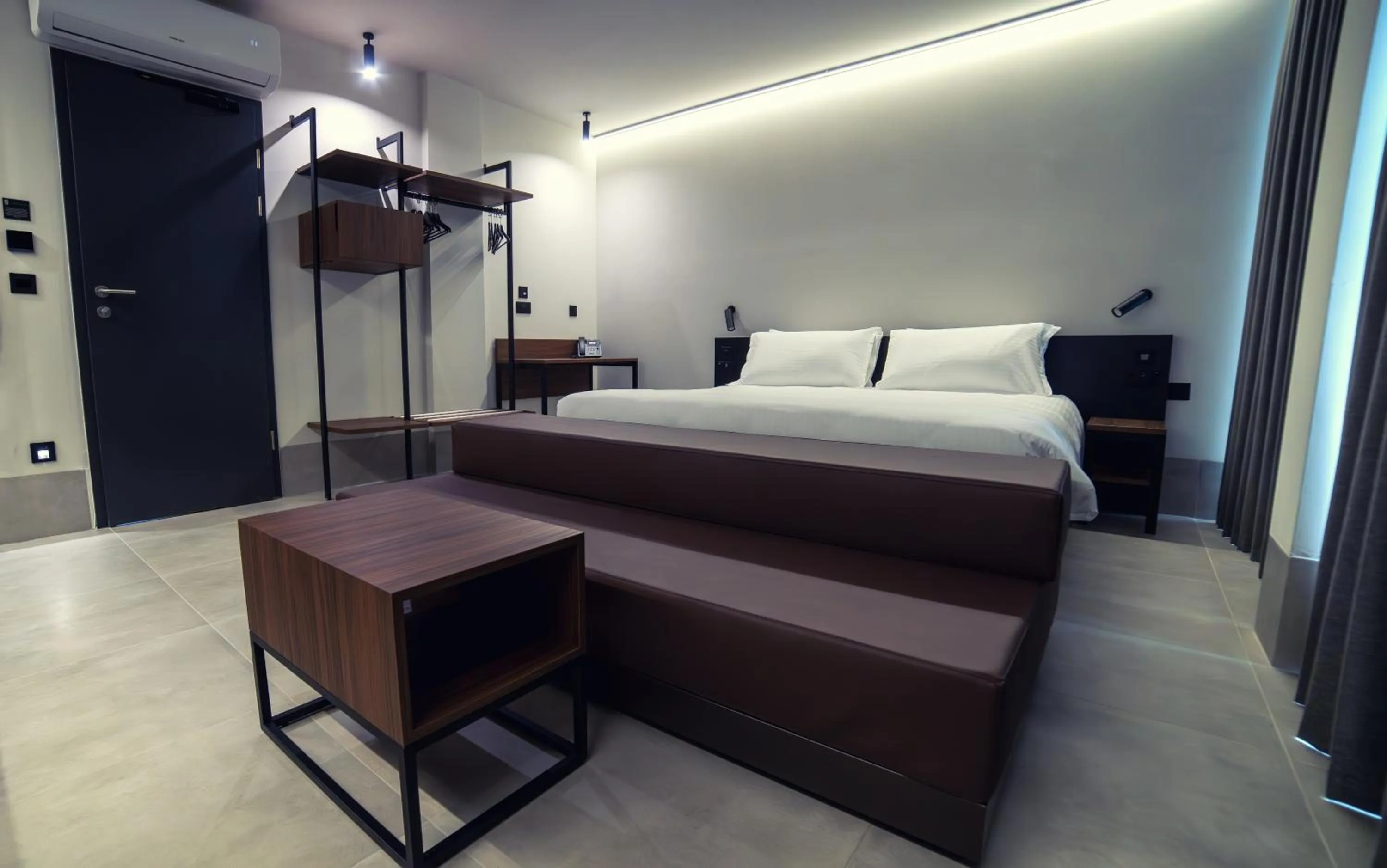 Bed in Onyx Suites & Apartments