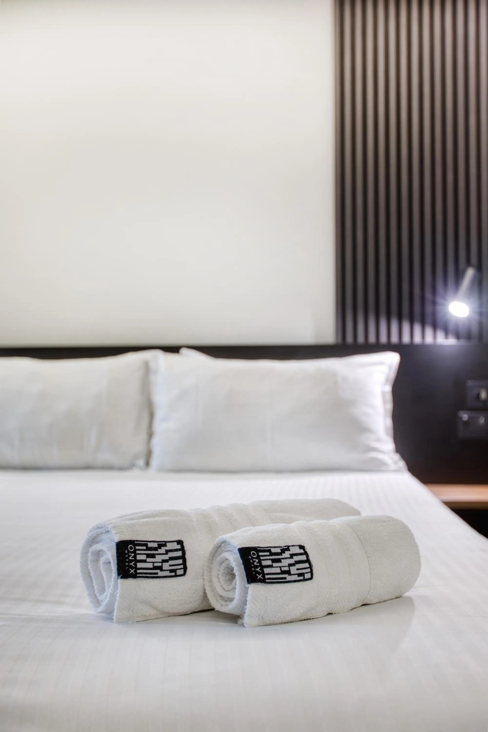 Bed in Onyx Hotel