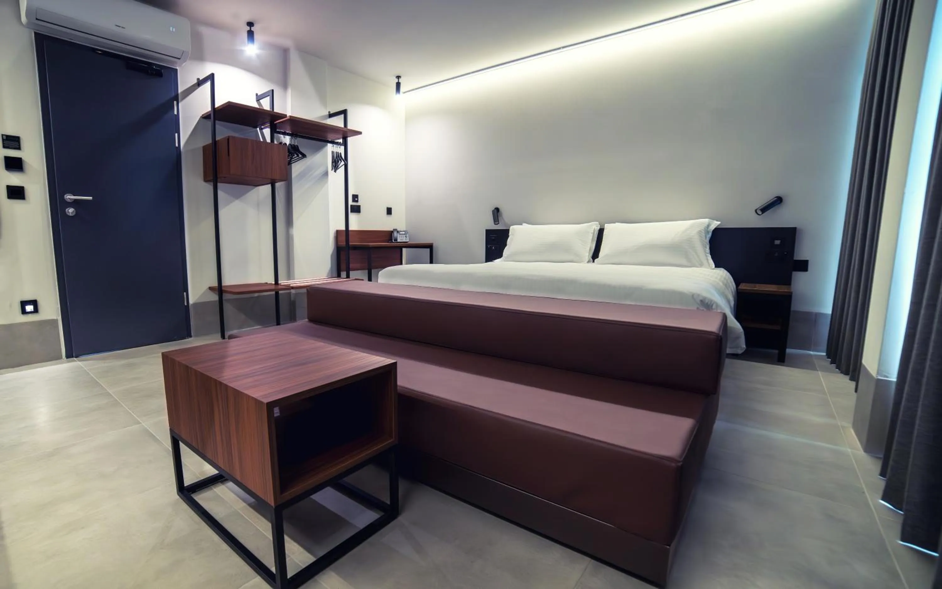 Bed in Onyx Suites & Apartments