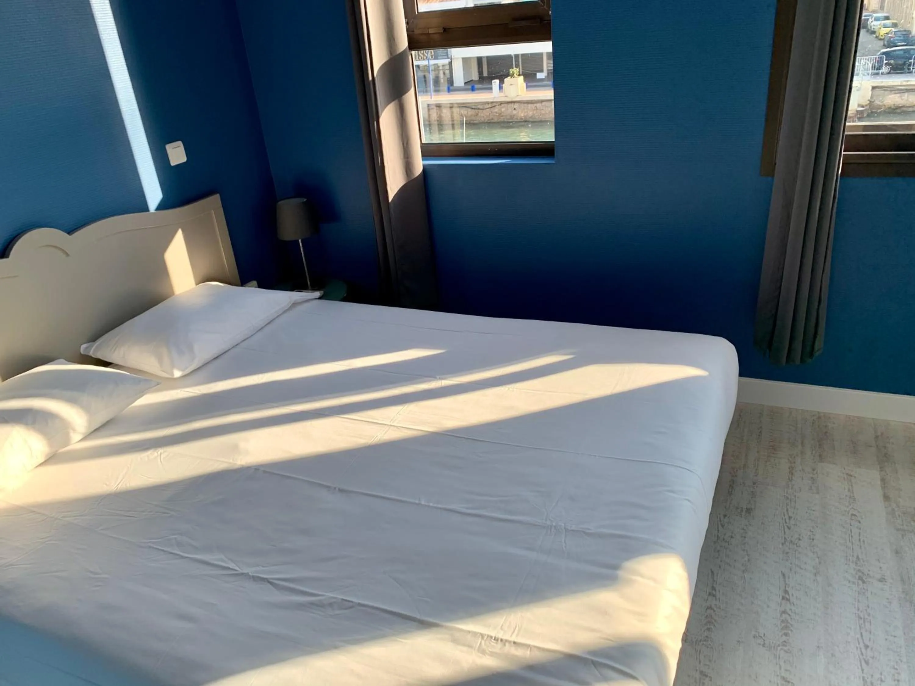 View (from property/room), Bed in Hotel Le Petit Baigneur Palavas Plage