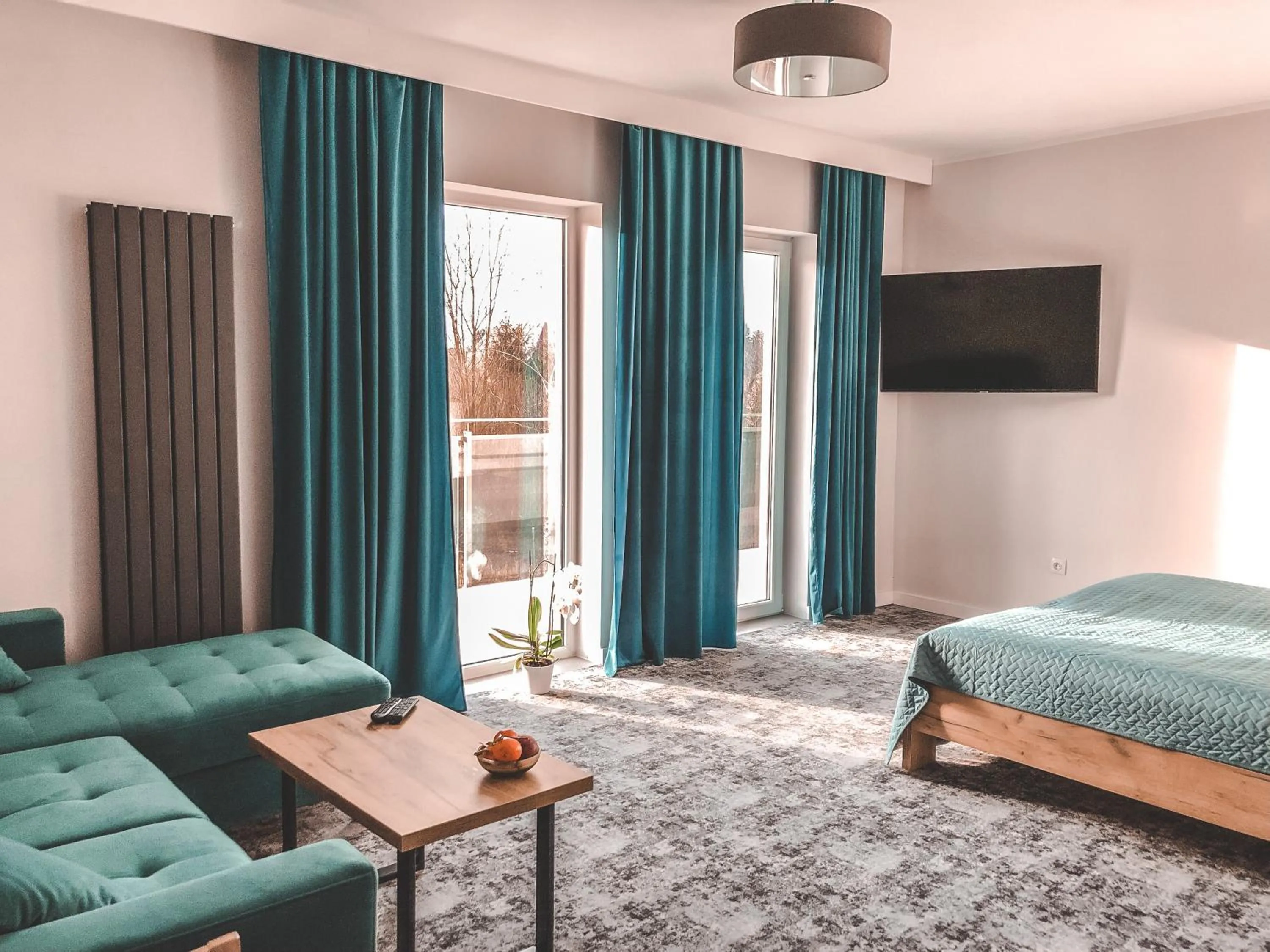 Living room, Bed in La Park Aparthotel